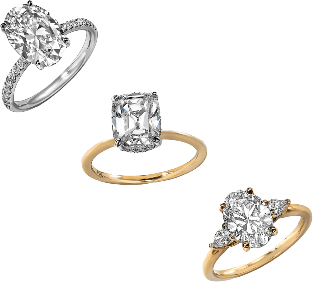 Three diamond engagement rings on green background.