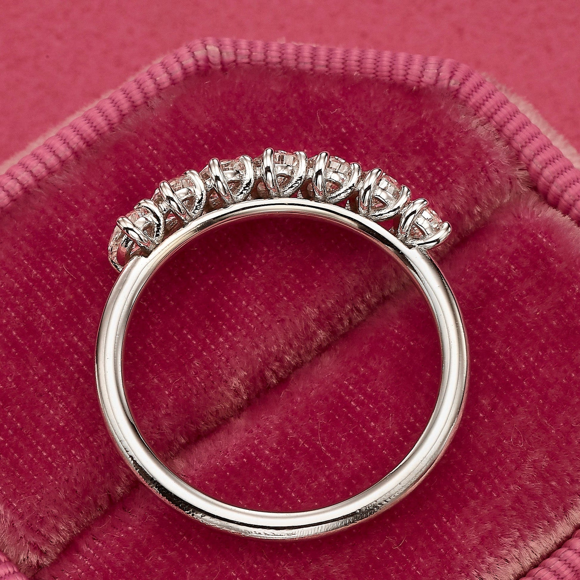 Diamond ring on pink velvet.