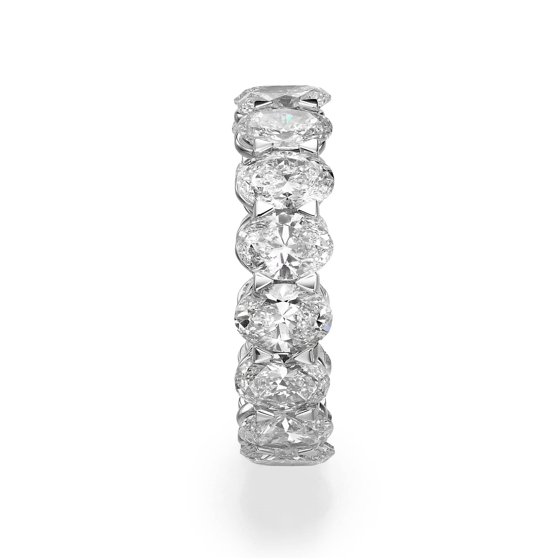 Diamond eternity ring with oval cut stones.