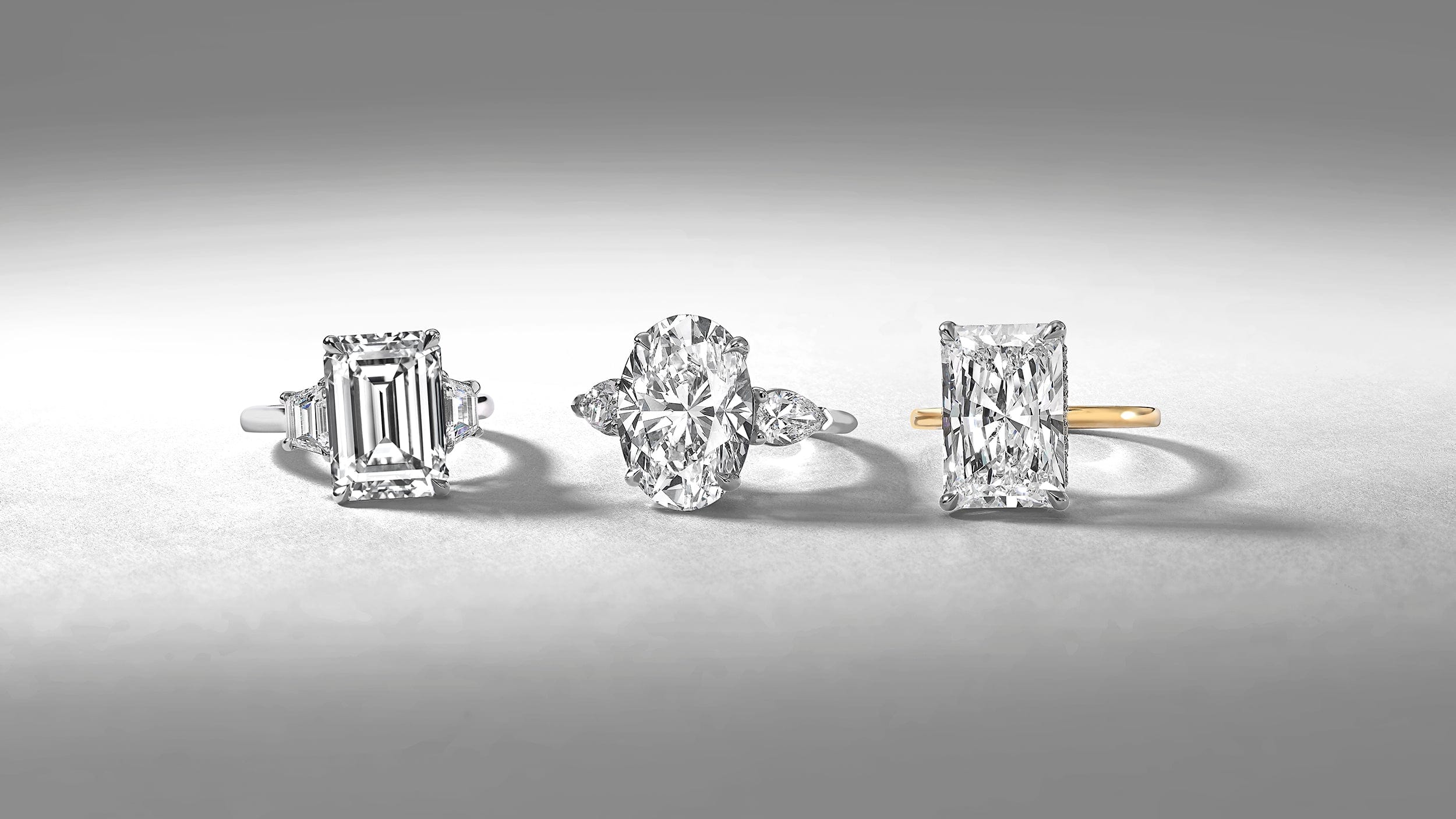 Three diamond engagement rings.