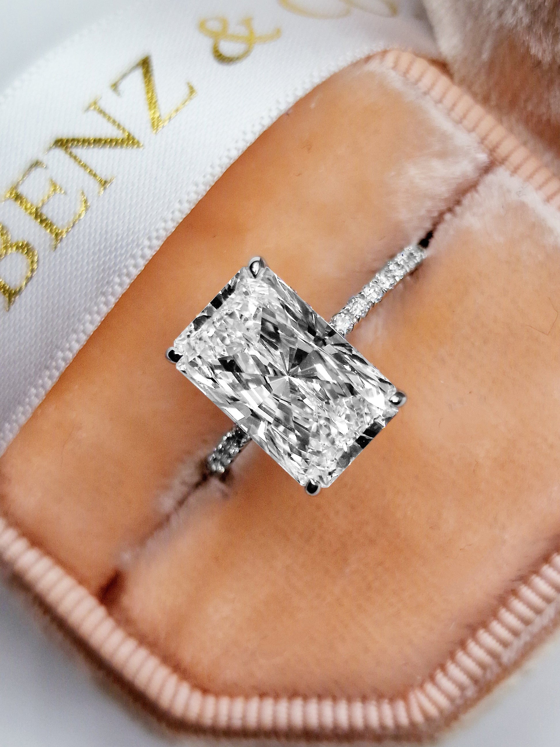 Diamond ring in a velvet ring box.