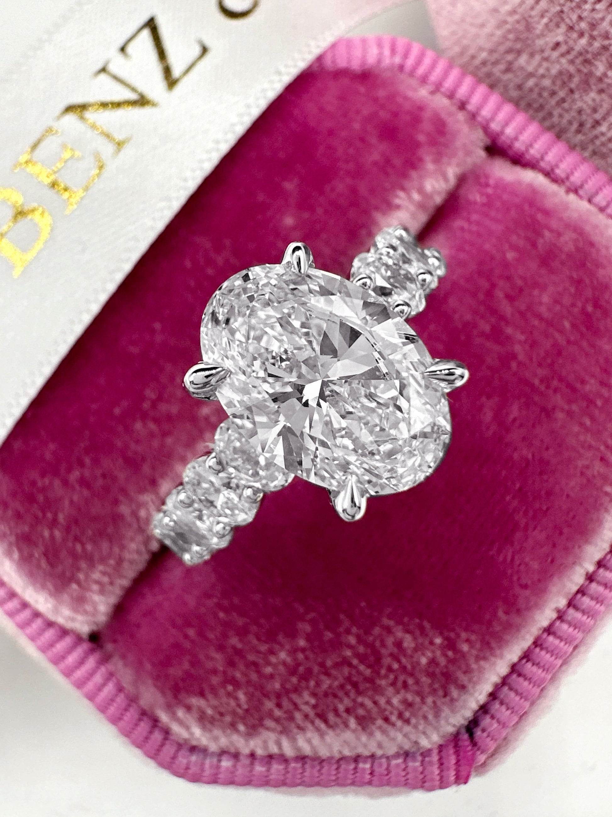 2ct oval lab grown diamond ring with hidden halo in white gold