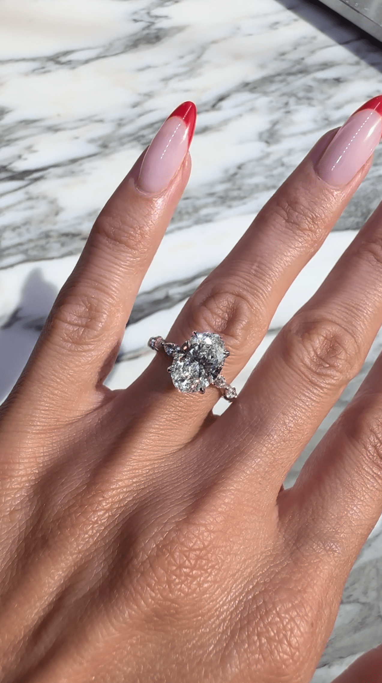 Oval cut lab grown diamond engagement ring in white gold