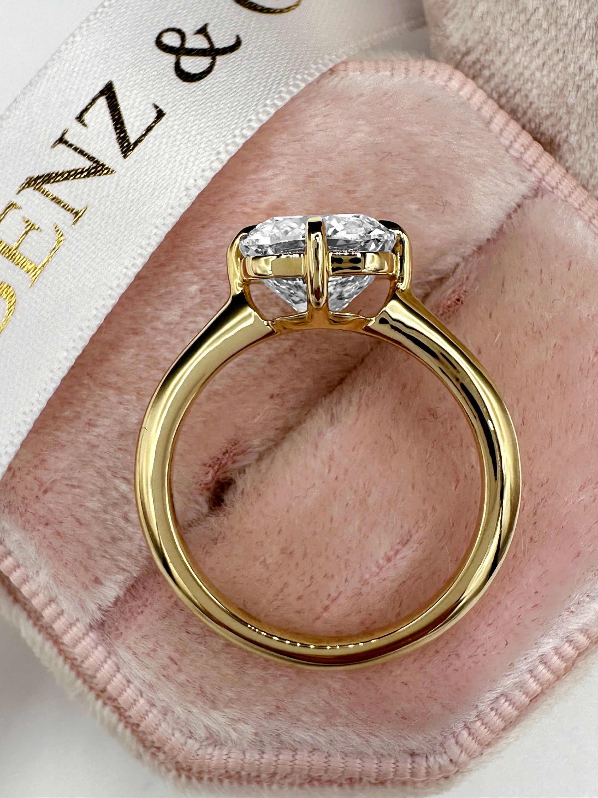 Cushion cut diamond engagement ring in 14K yellow gold