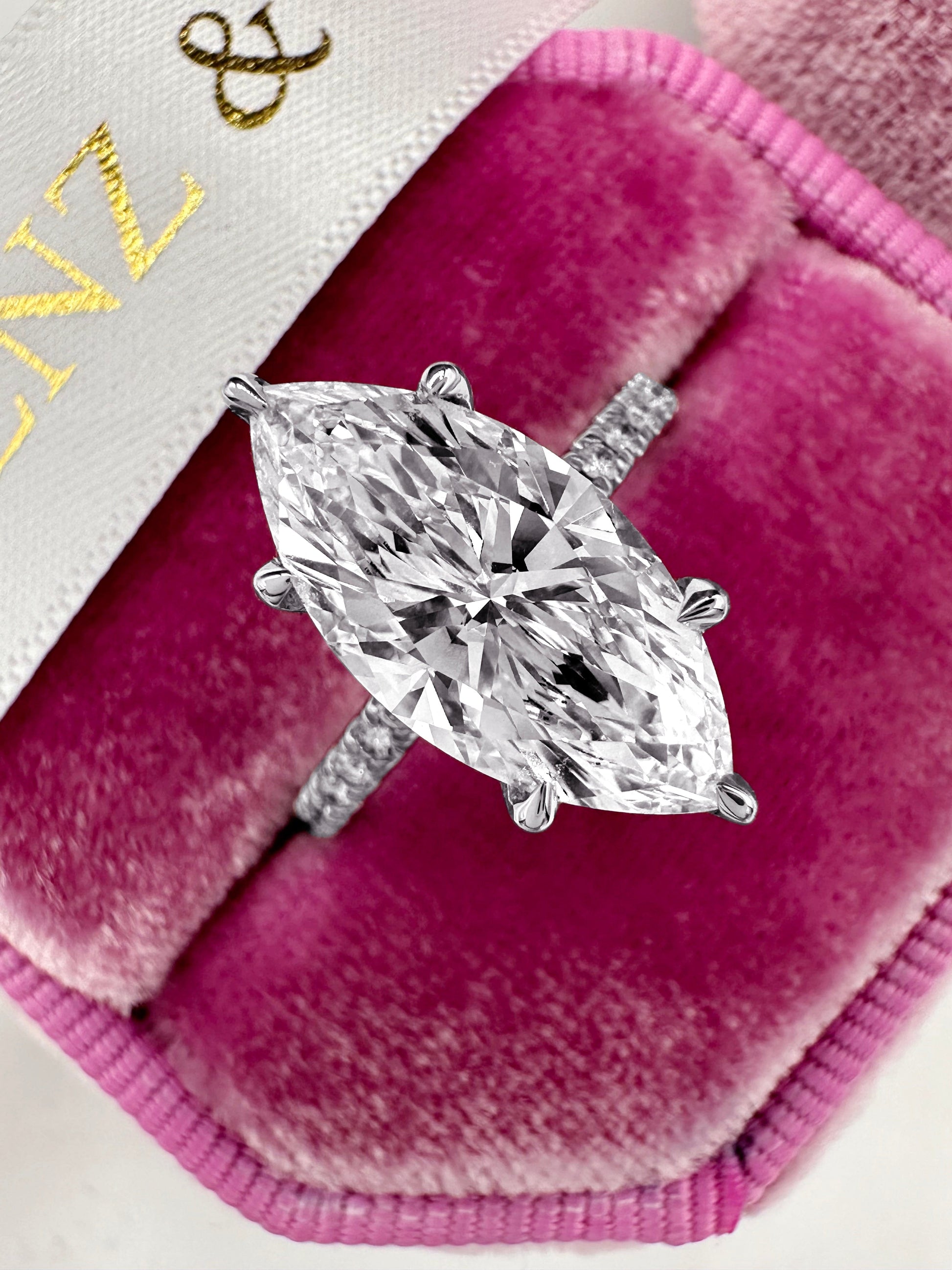 3ct marquise diamond hidden halo engagement ring in white gold
