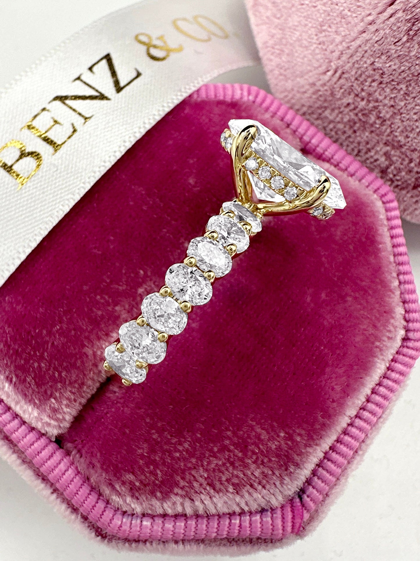 3ct Oval lab diamond ring with hidden halo and eternity band.