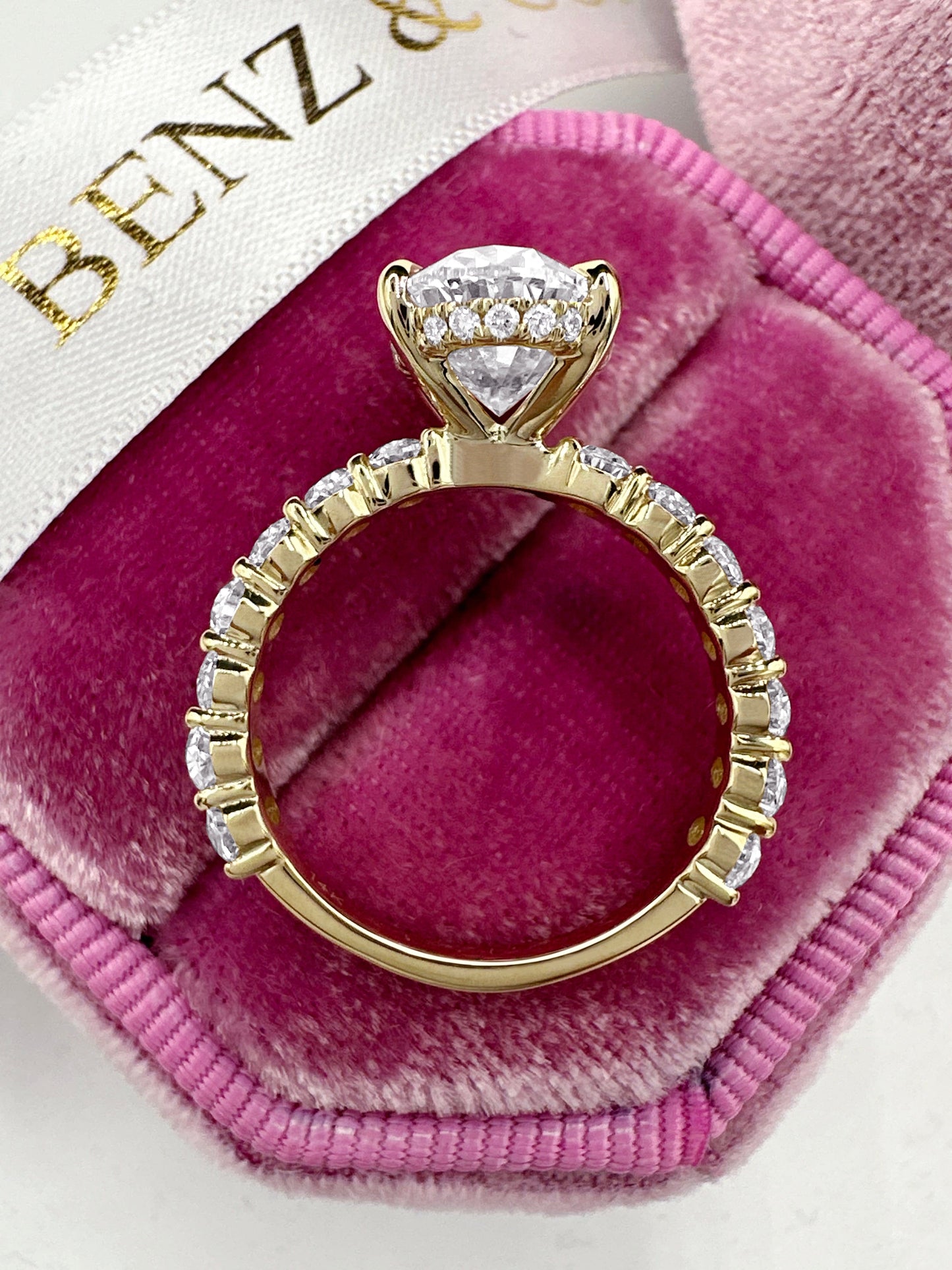 3ct oval cut lab grown diamond ring with hidden halo and eternity band