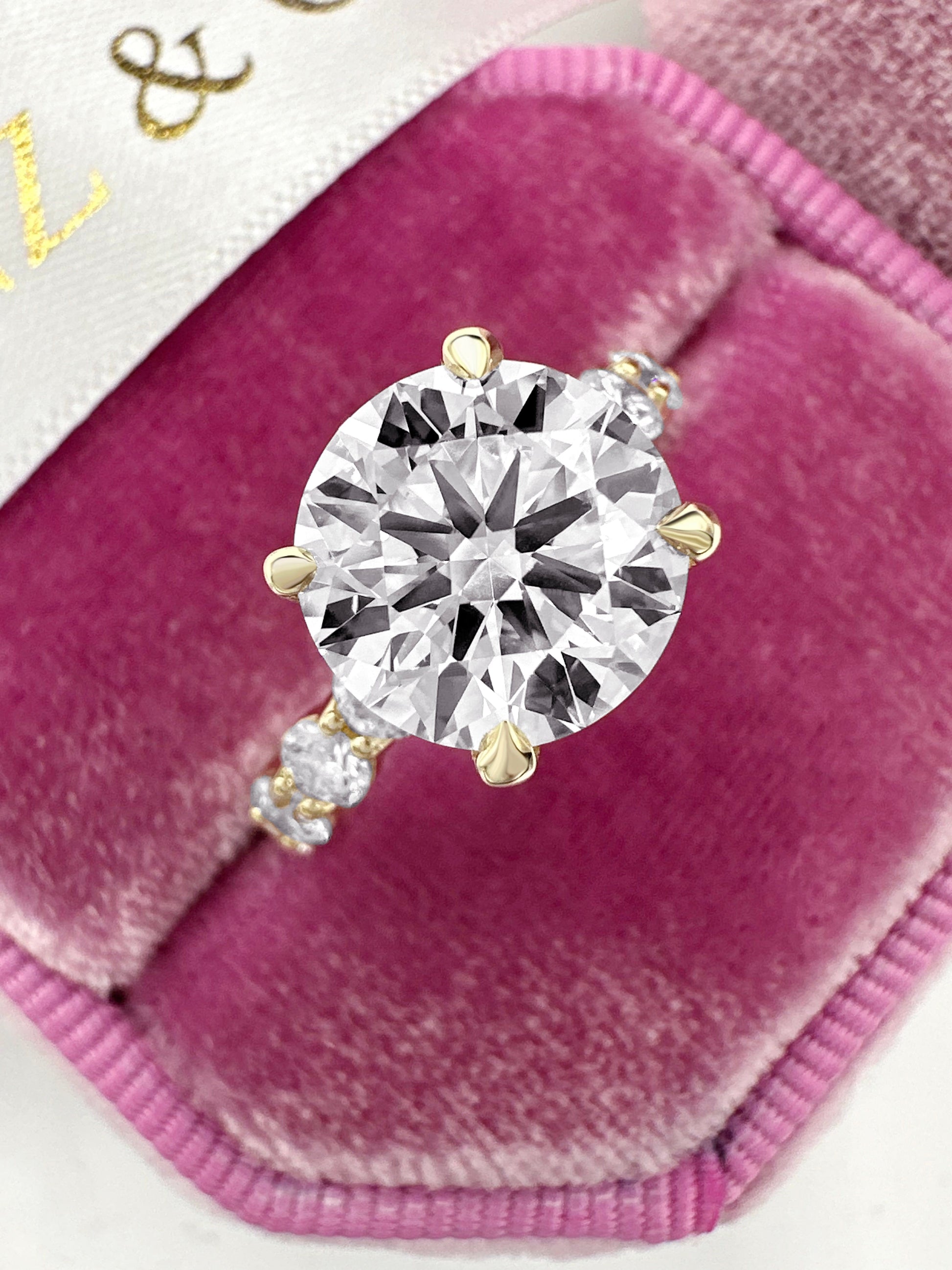 3ct round diamond engagement ring with side diamonds and halo, 14k yellow gold