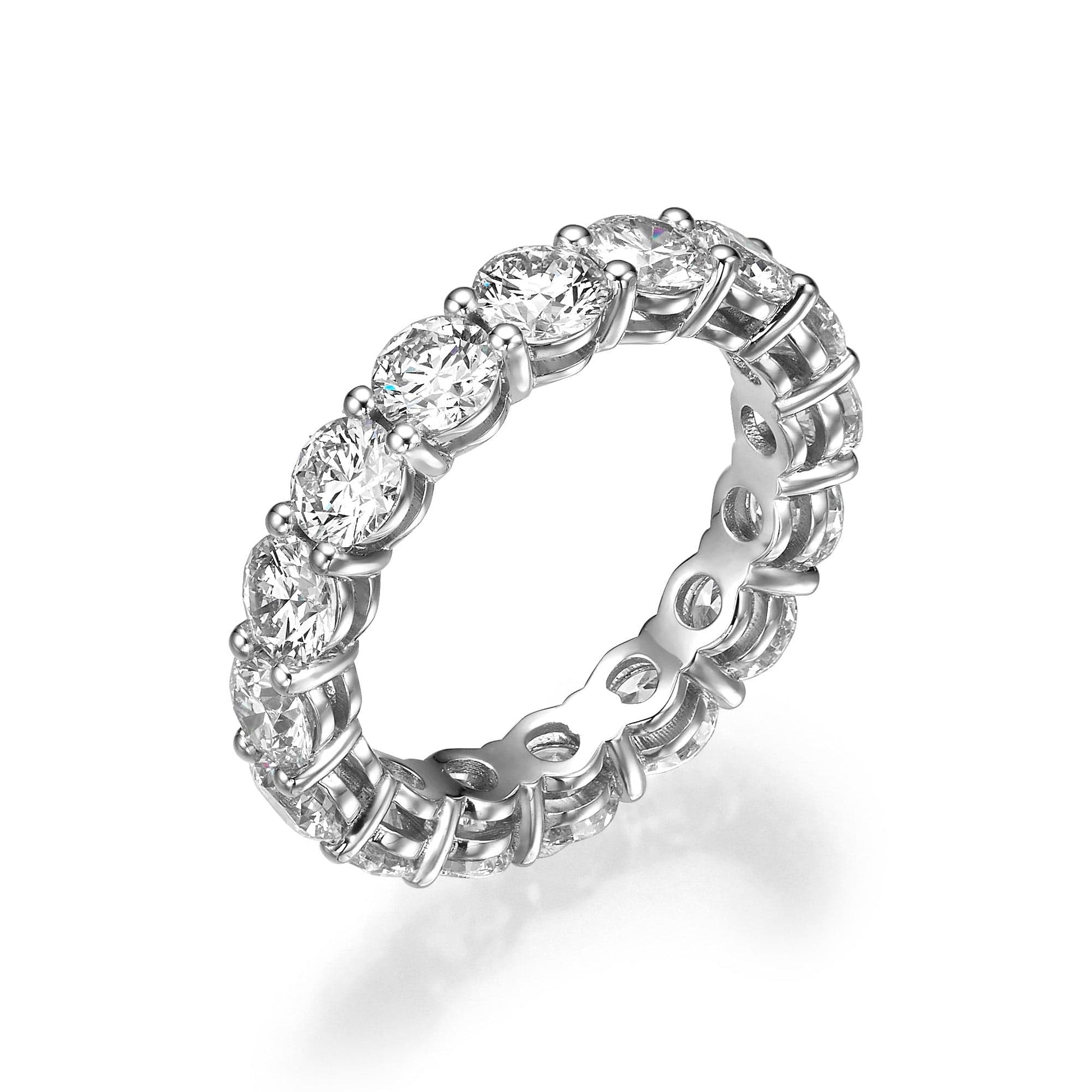 Diamond eternity ring on white background.