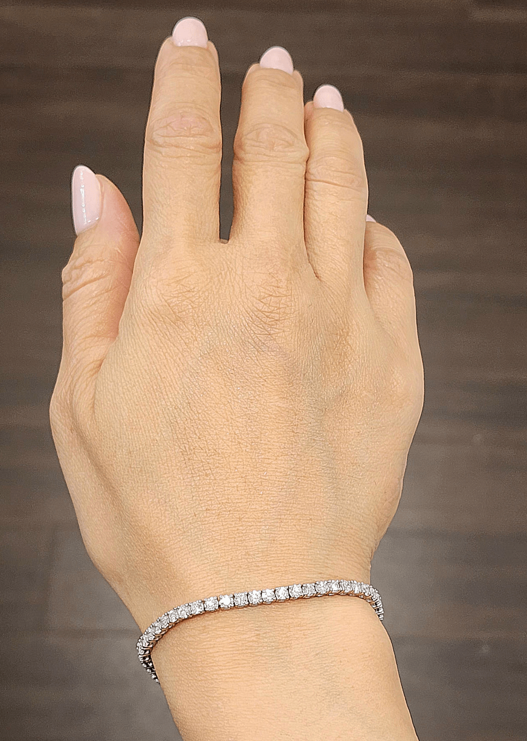 4ct tennis bracelet with lab grown diamonds on wrist