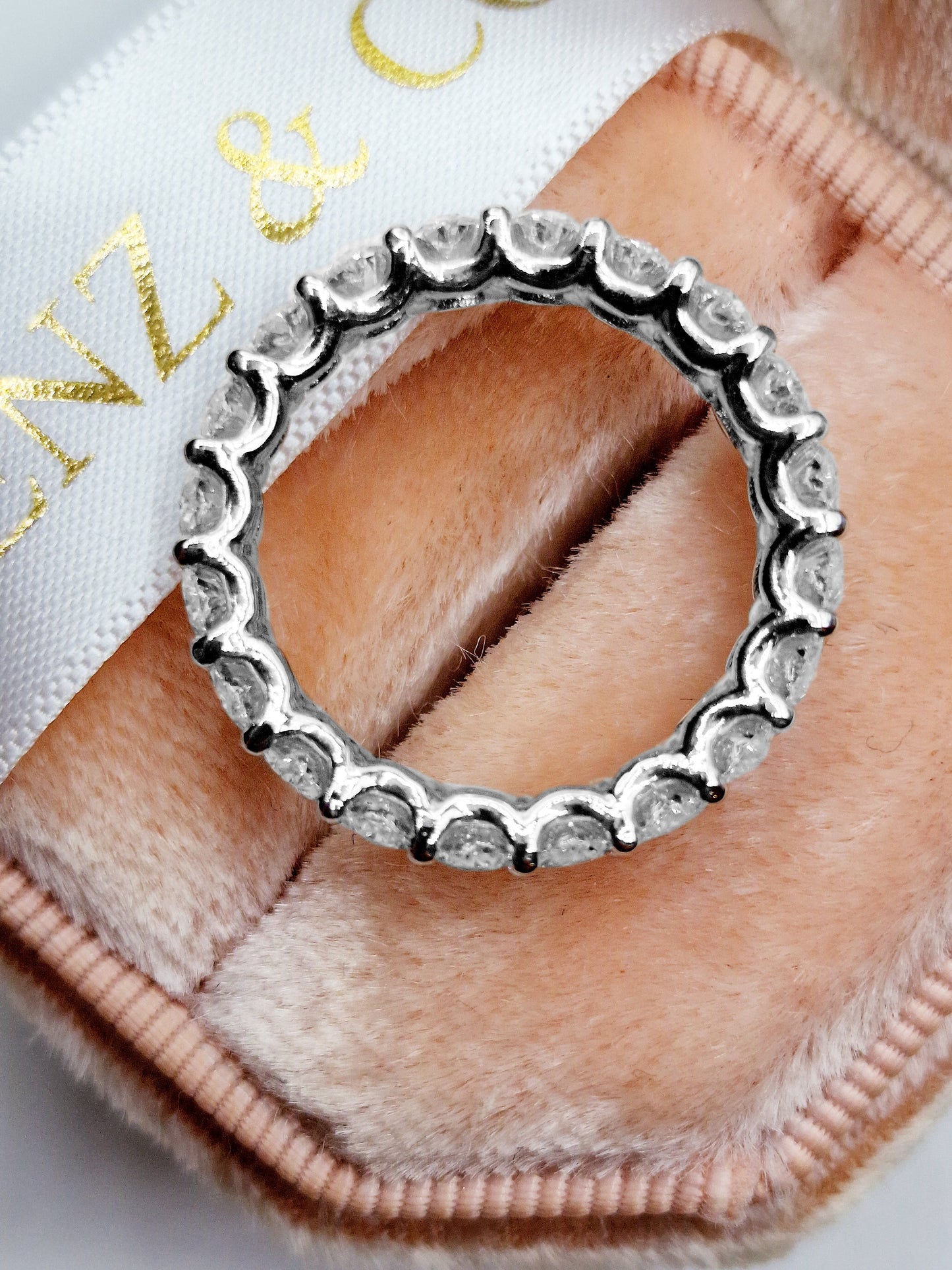 4ct U-shape oval diamond eternity band in white gold