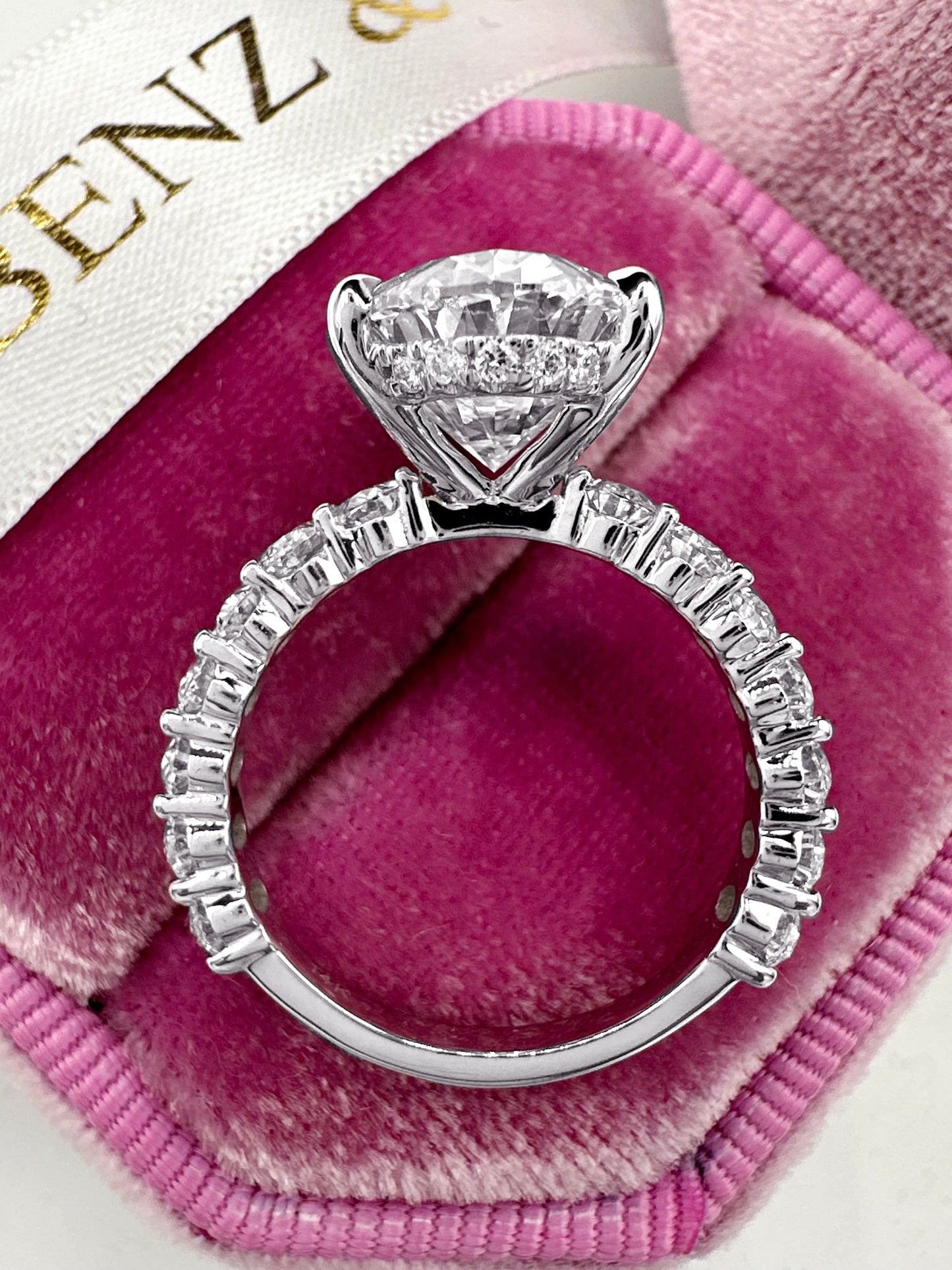 5ct Oval cut diamond ring with hidden halo