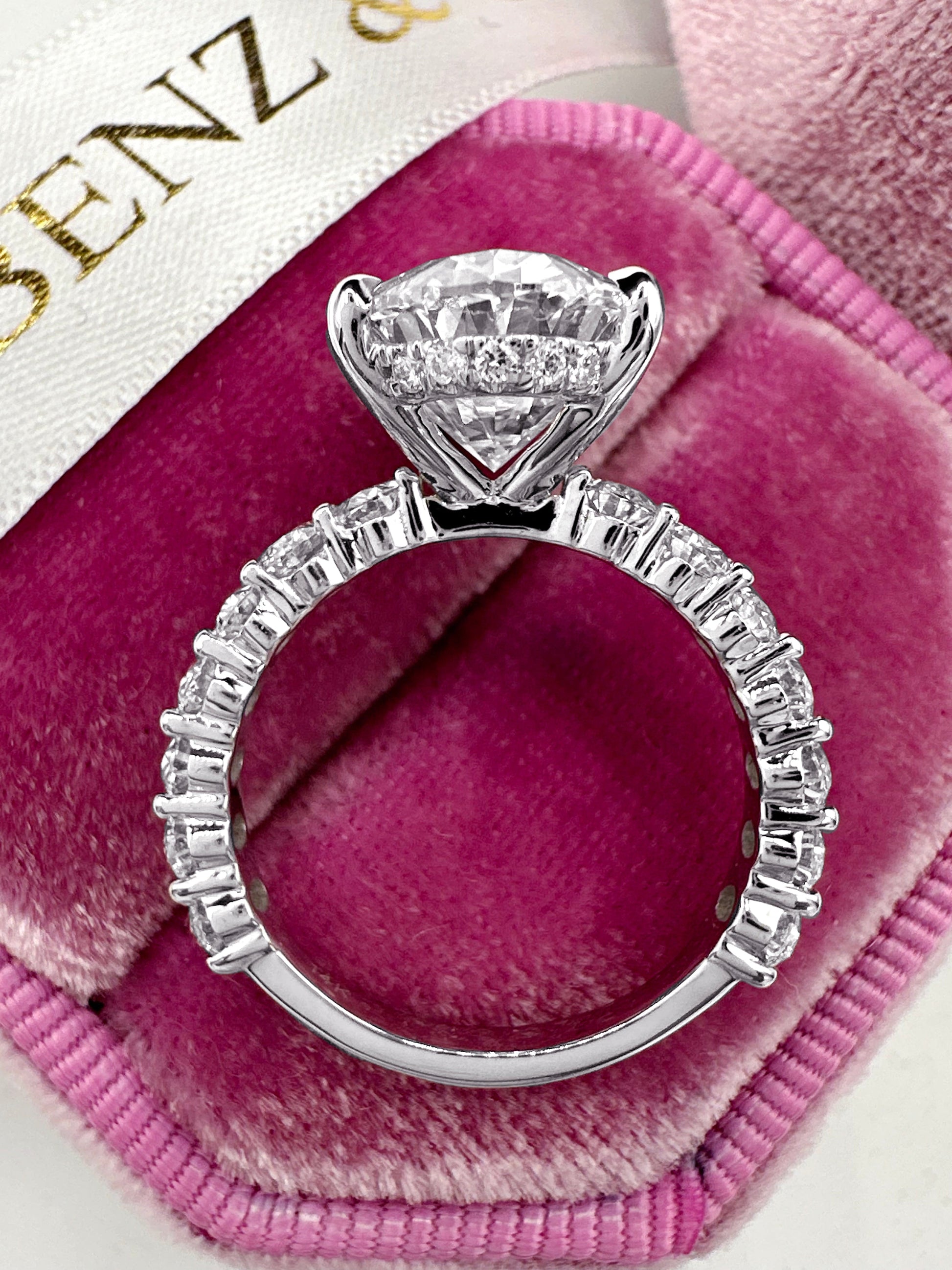 5ct Oval cut diamond ring with hidden halo