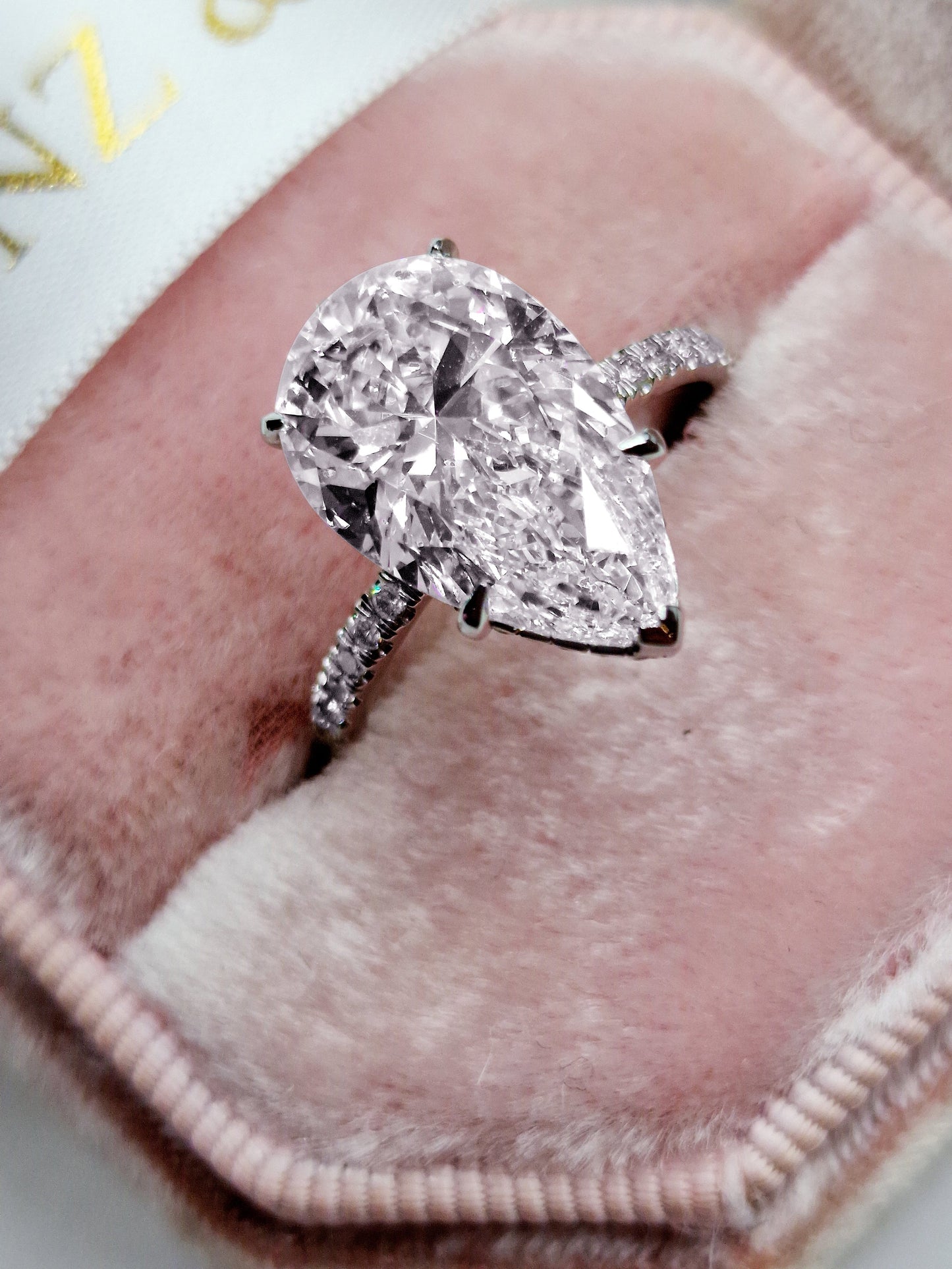 5ct pear-shaped diamond engagement ring, 14k white gold, hidden halo