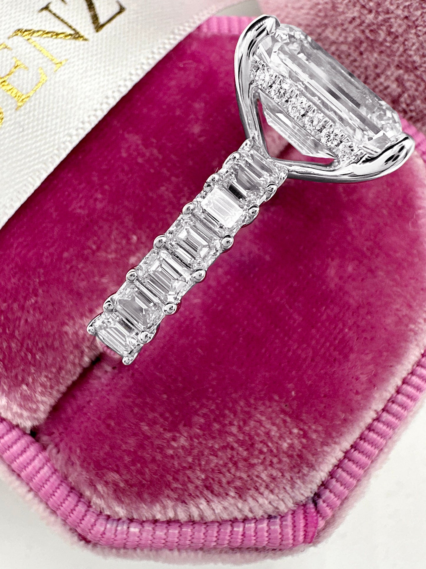 Emerald cut diamond engagement ring in 14k white gold