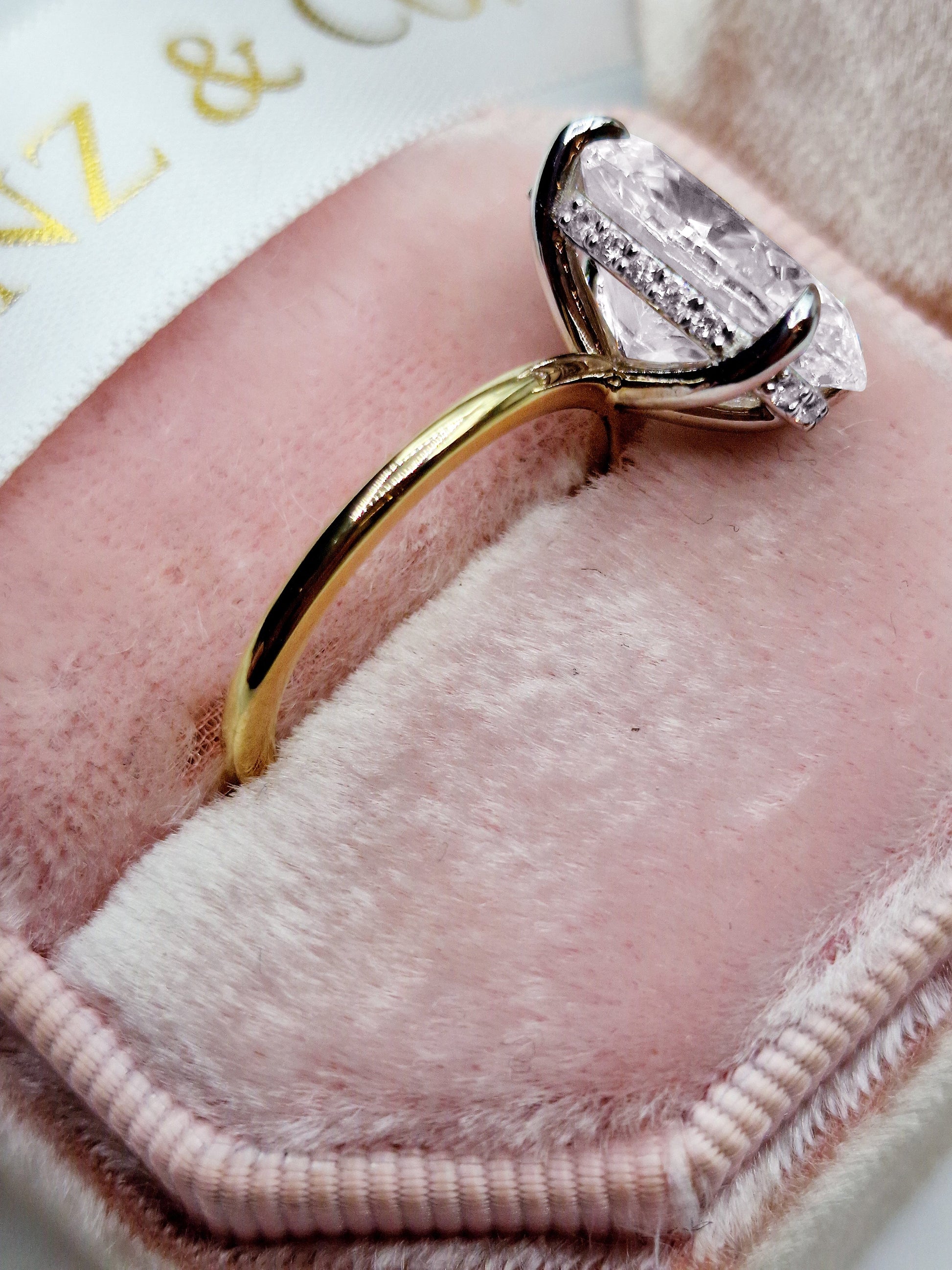 5ct oval two-tone hidden halo diamond ring