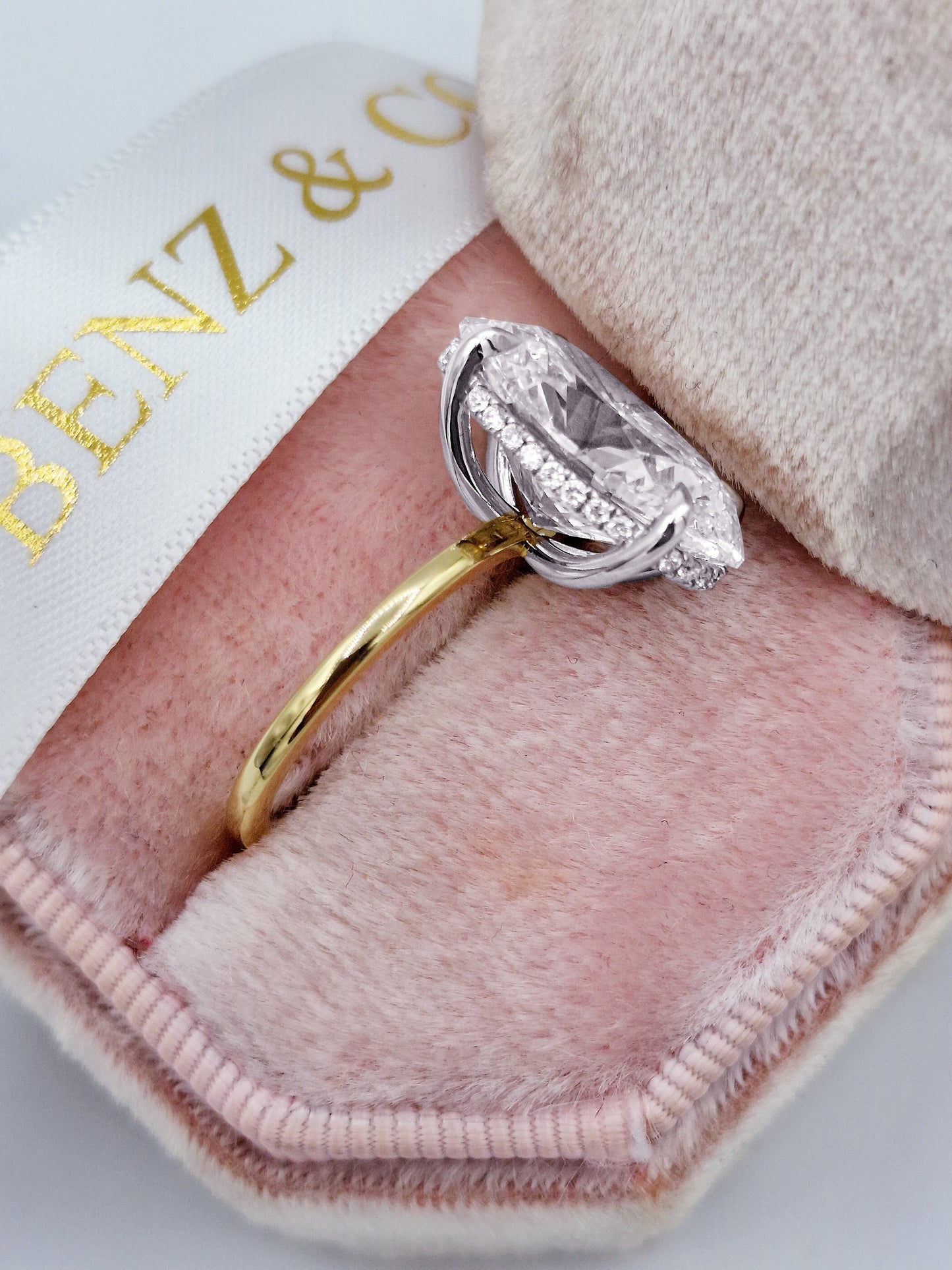7ct Oval Two-Tone Hidden Halo Diamond Ring