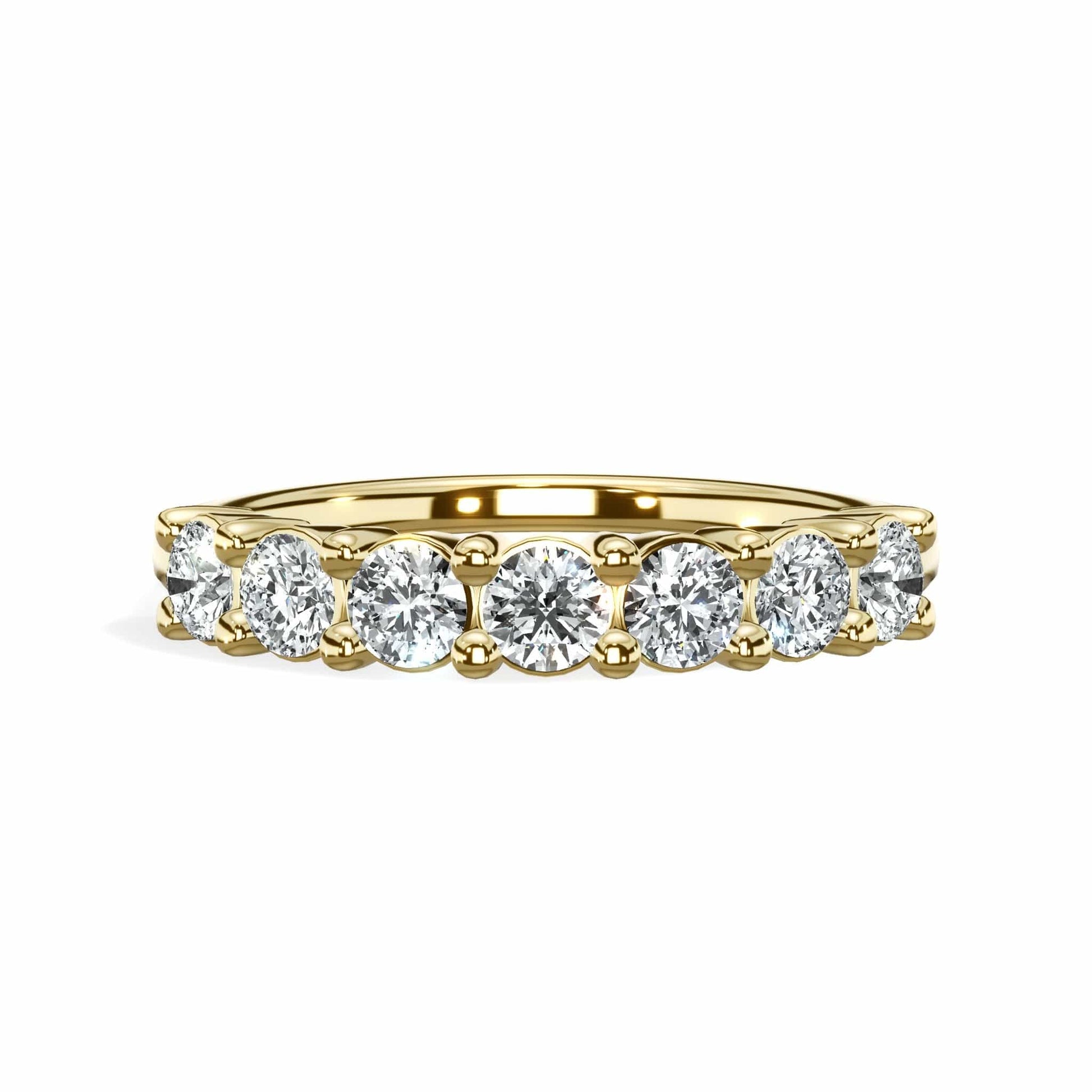 7-stone round diamond wedding band in yellow gold