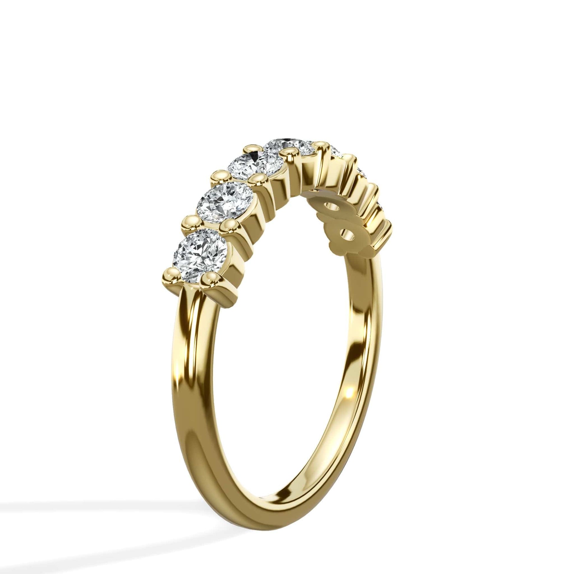 7-stone round diamond wedding band in yellow gold