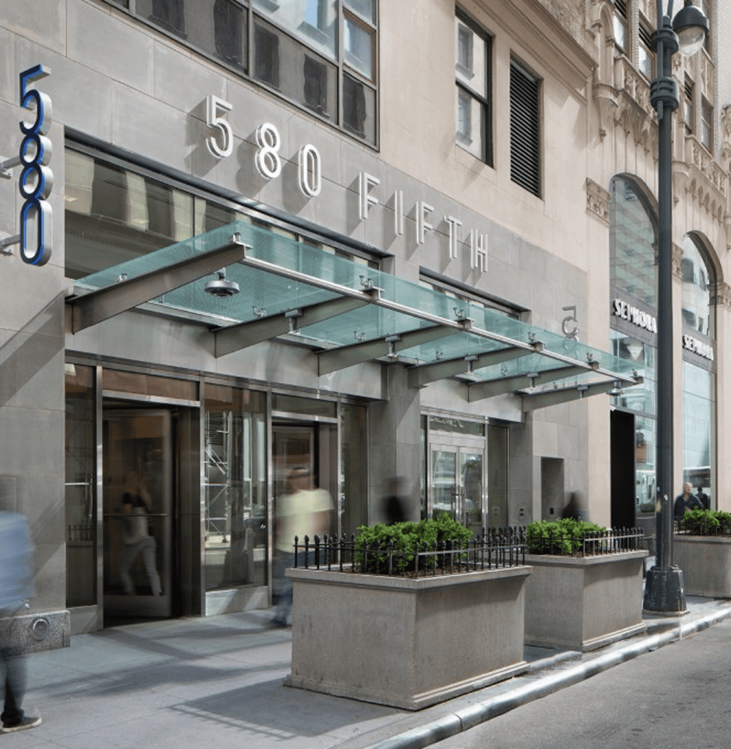 580 Fifth Avenue building entrance, frame 106