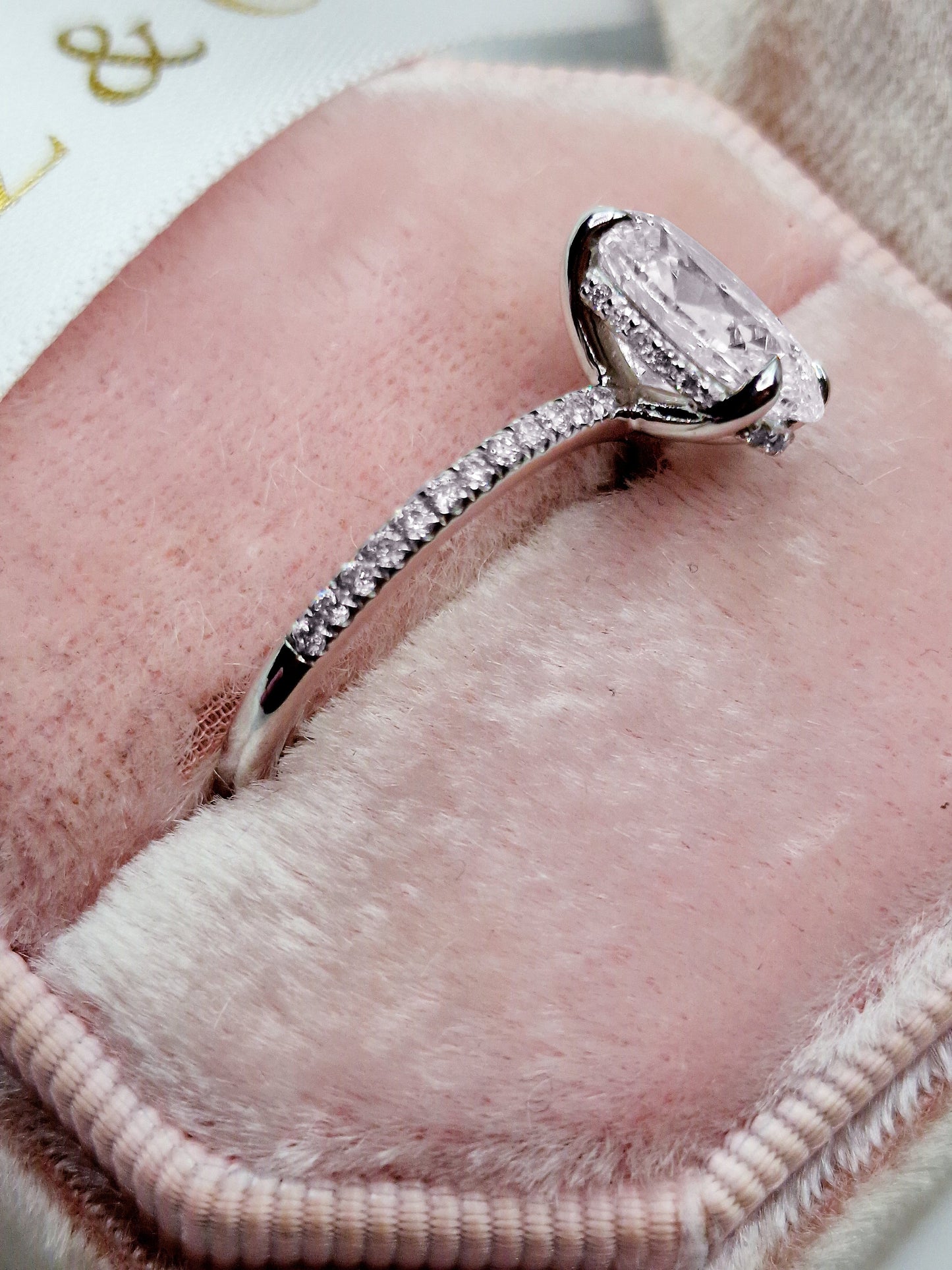 Oval cut 2ct lab grown diamond engagement ring side view