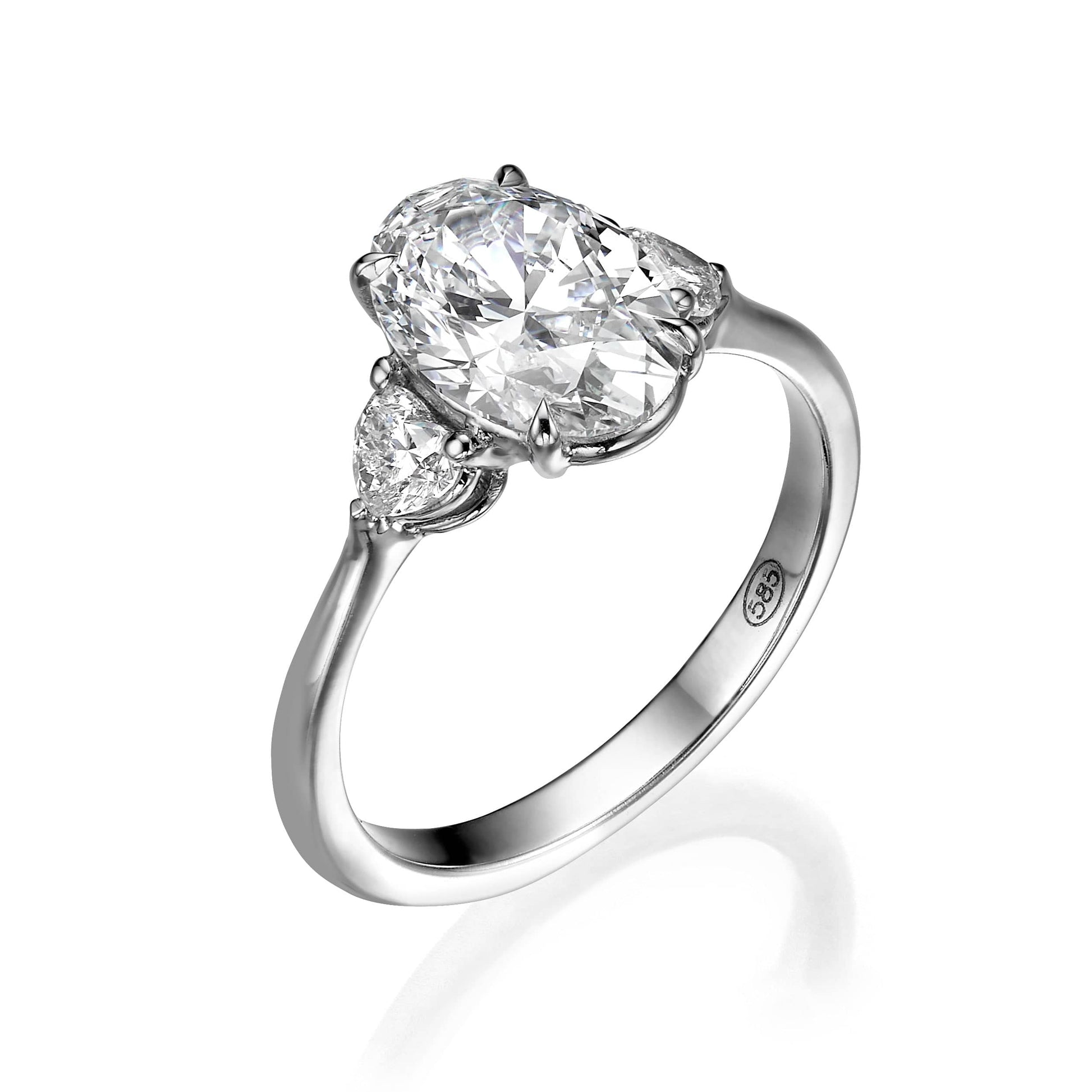 Oval diamond engagement ring with side stones