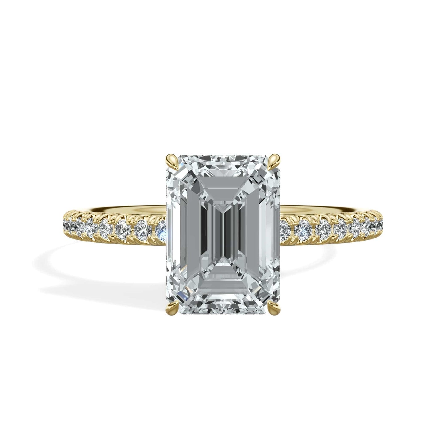 Emerald cut diamond ring in yellow gold