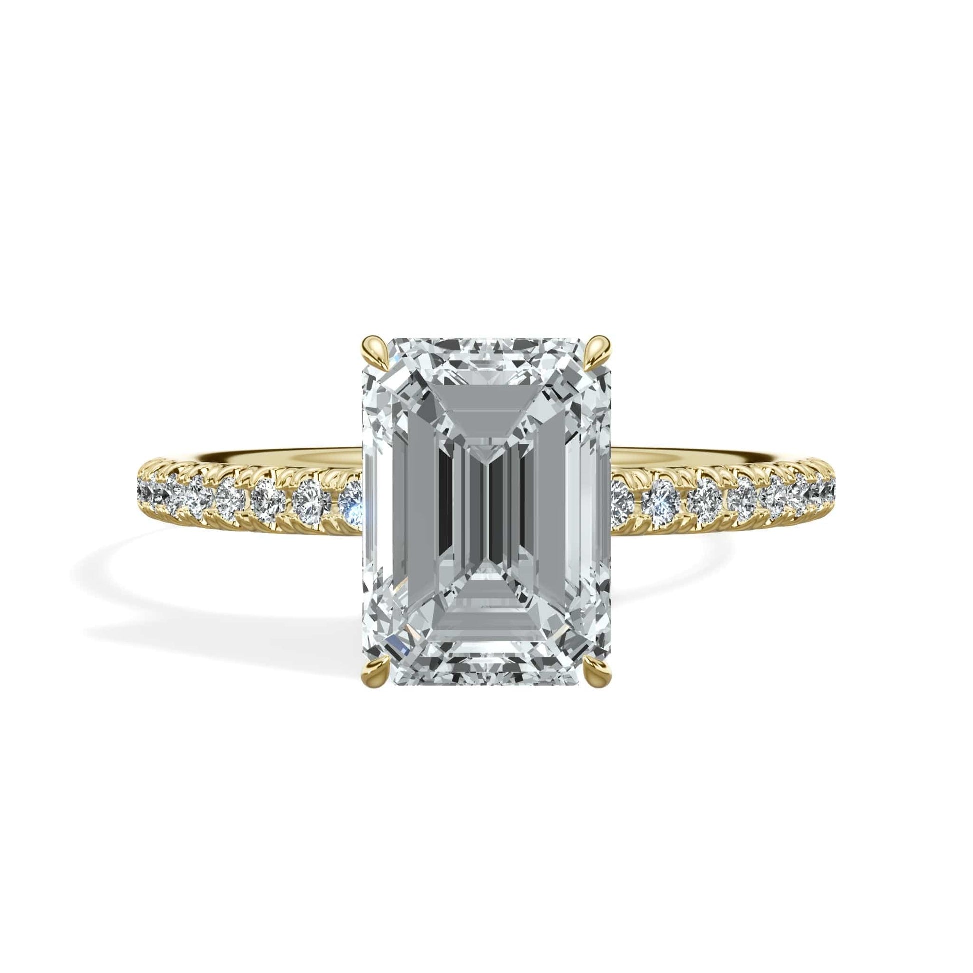 Emerald cut diamond ring in yellow gold