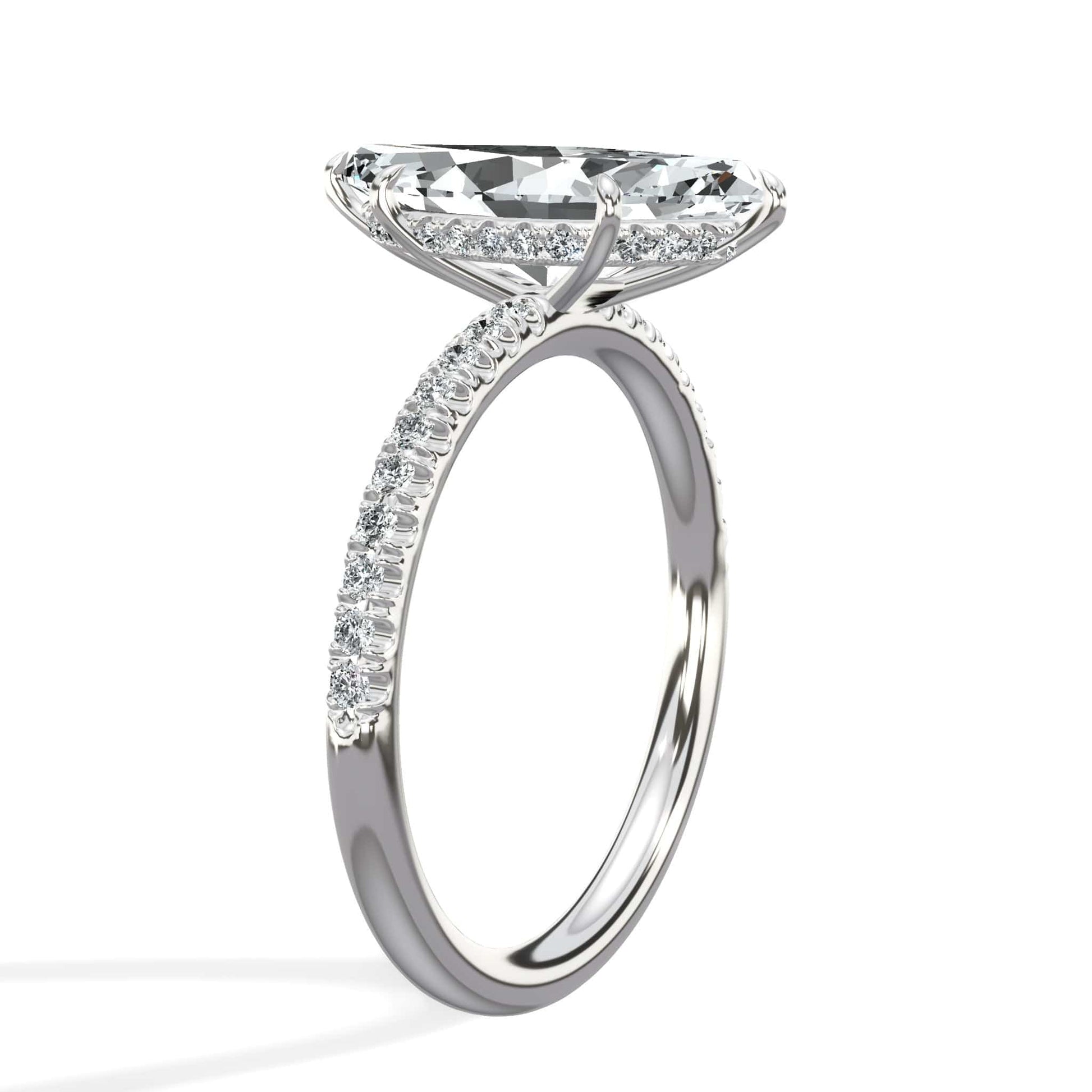 Marquise diamond ring with round diamond accents in white gold