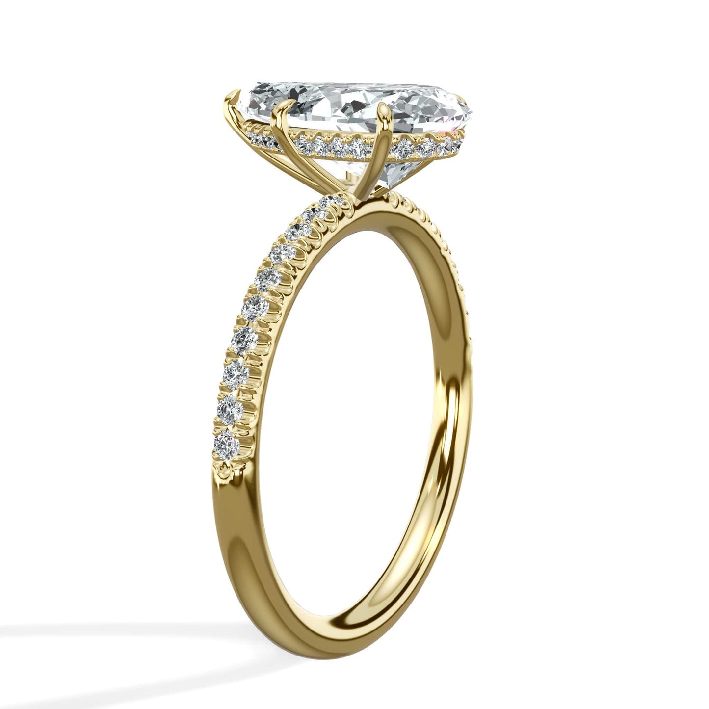 Pear diamond engagement ring in yellow gold