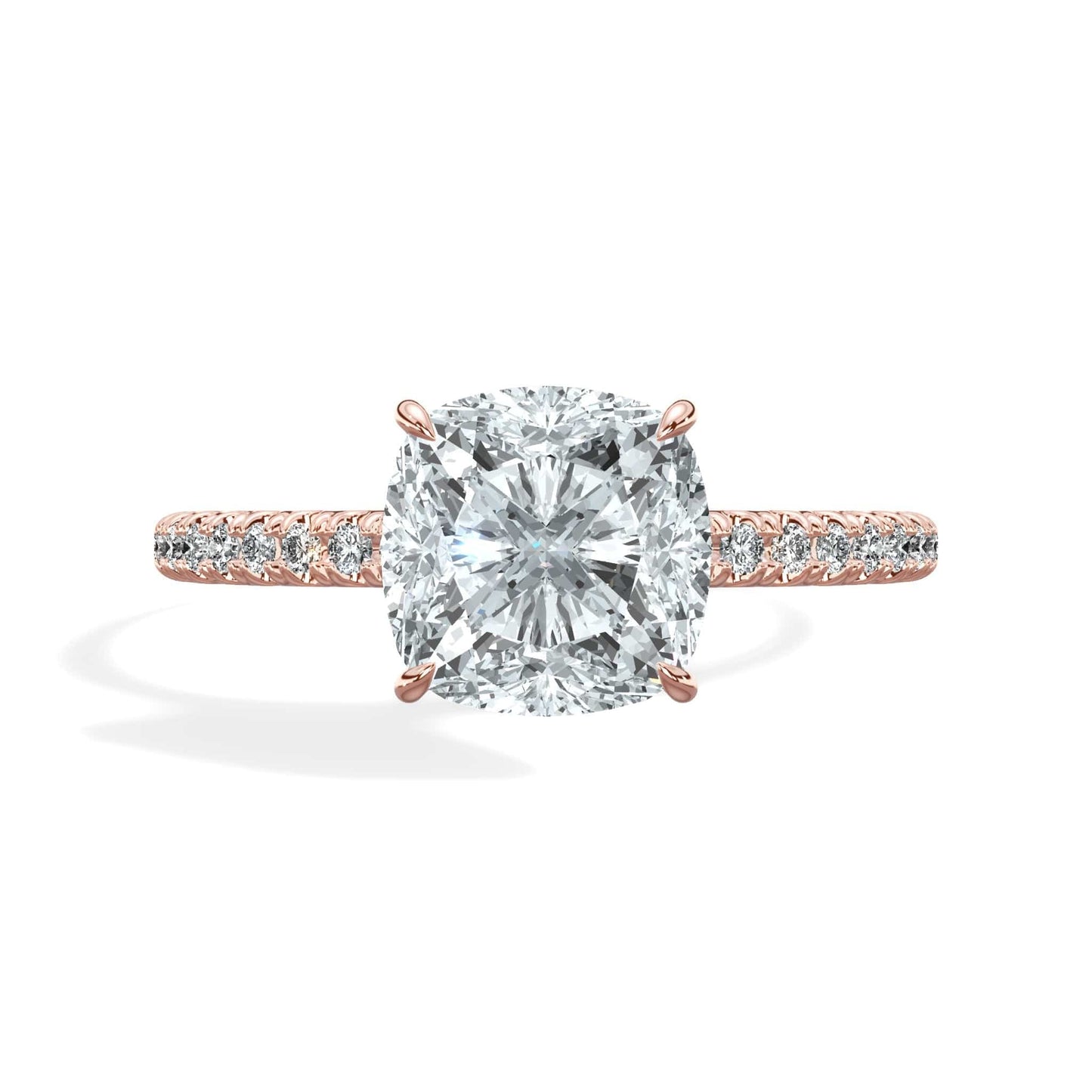 Cushion cut diamond ring with princess cut diamond accents in rose gold