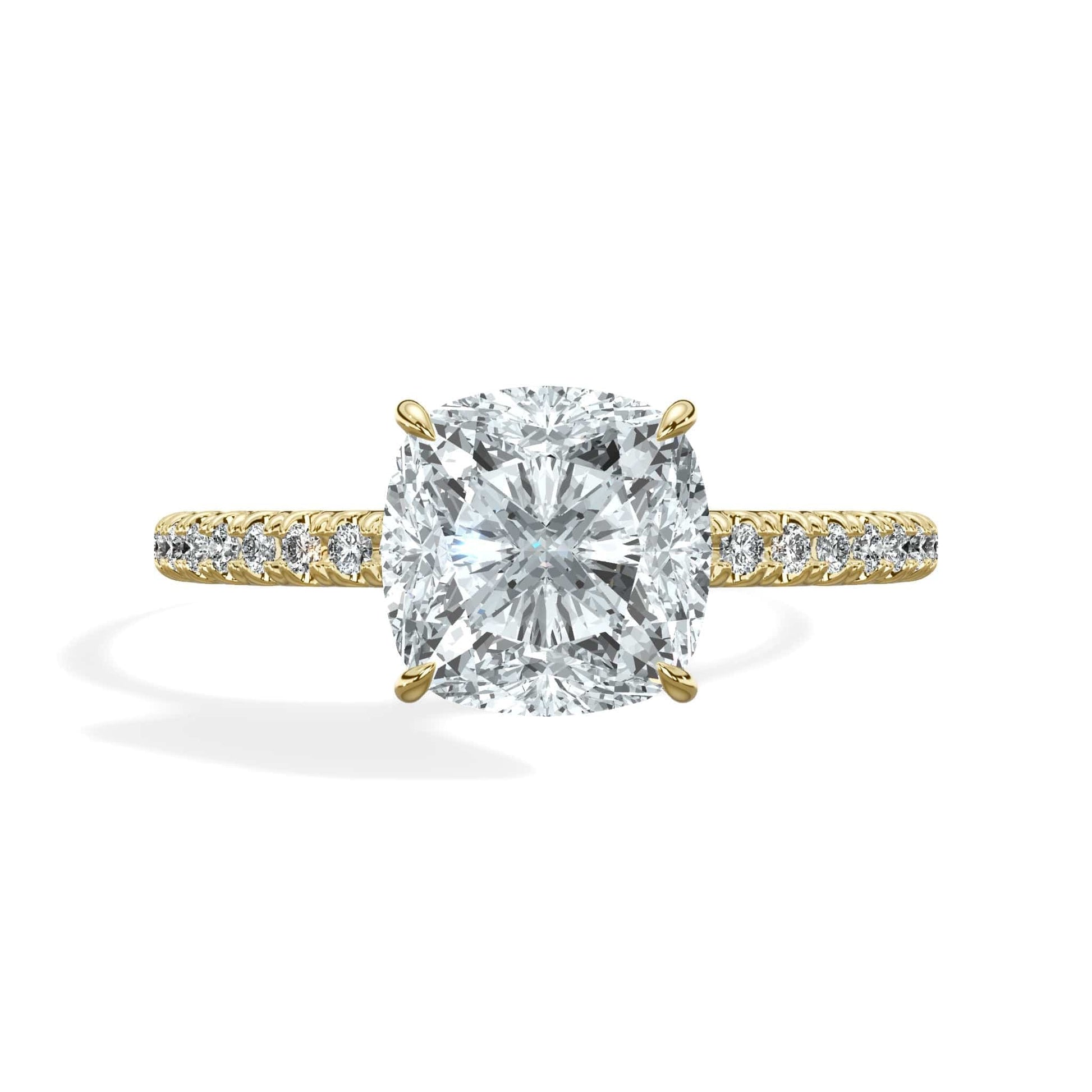 Cushion cut diamond ring in yellow gold