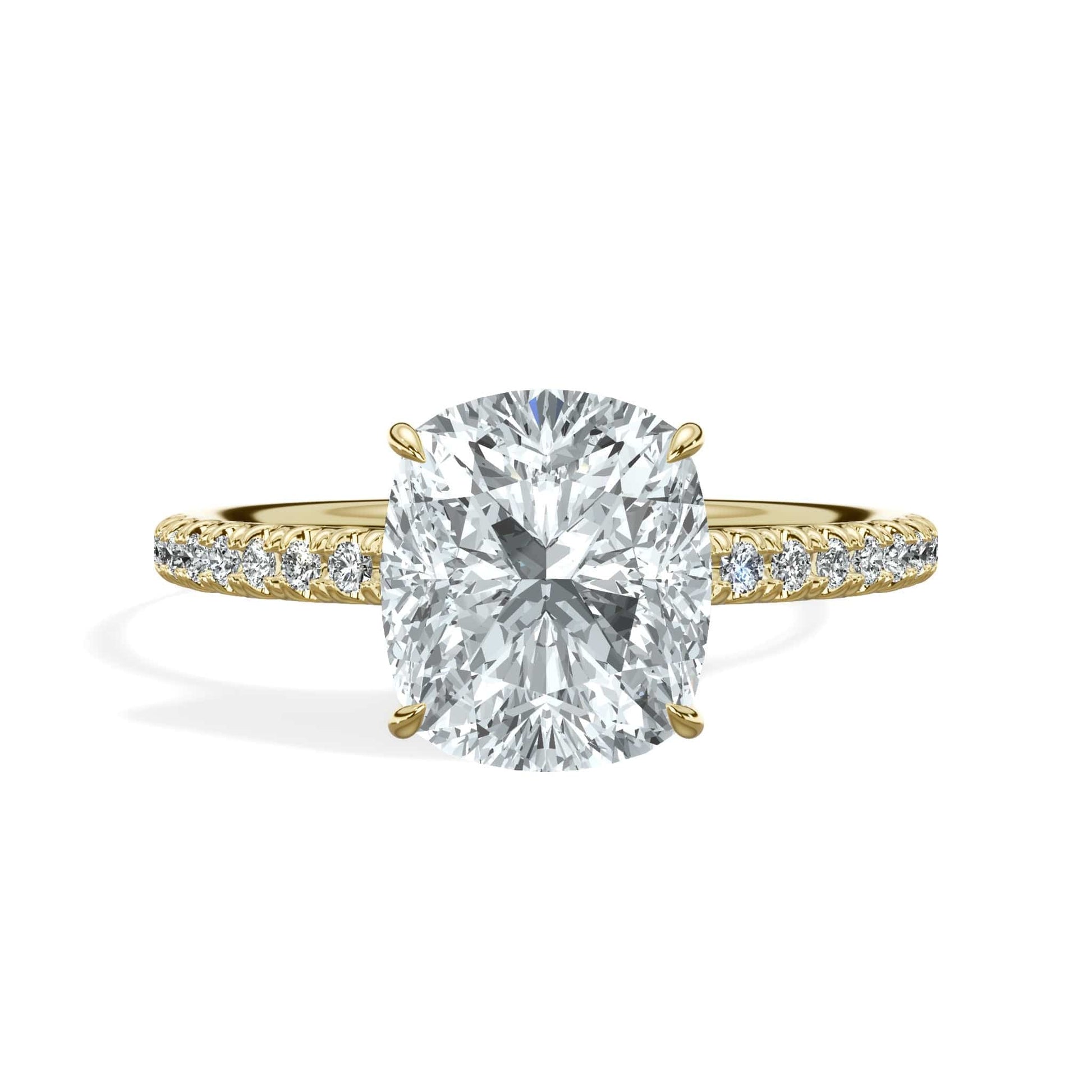 Cushion cut diamond ring in yellow gold