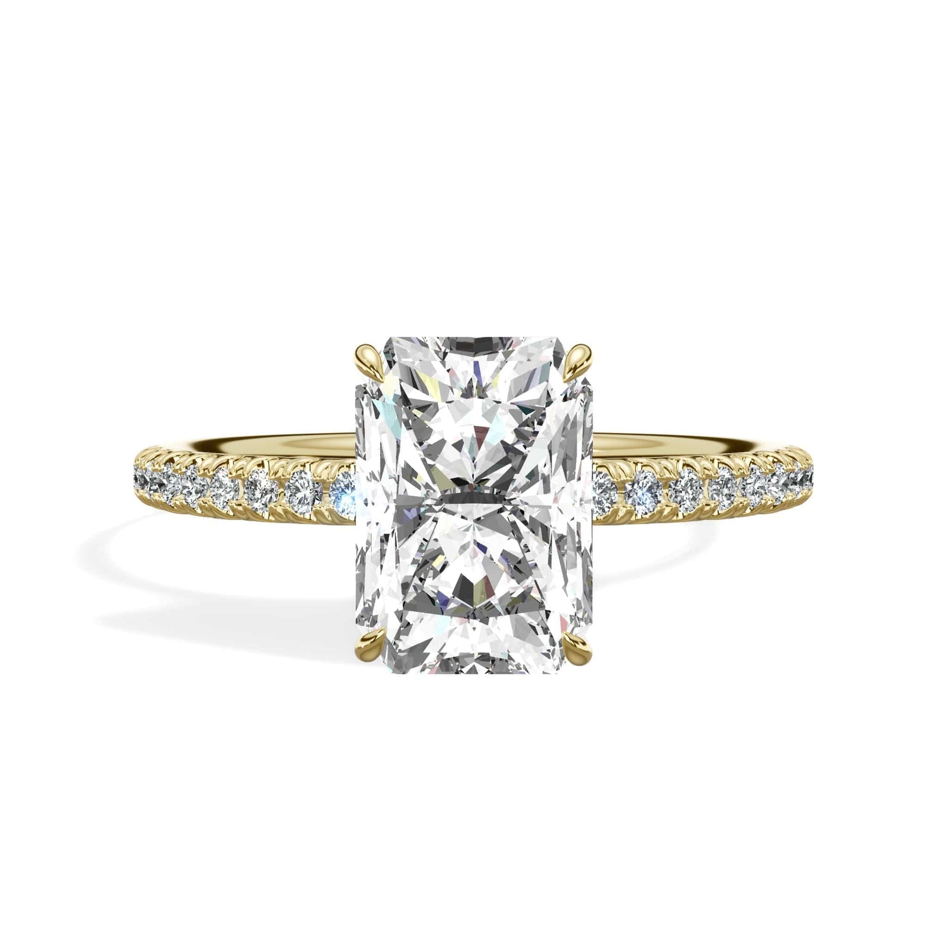 Radiant cut diamond ring in yellow gold