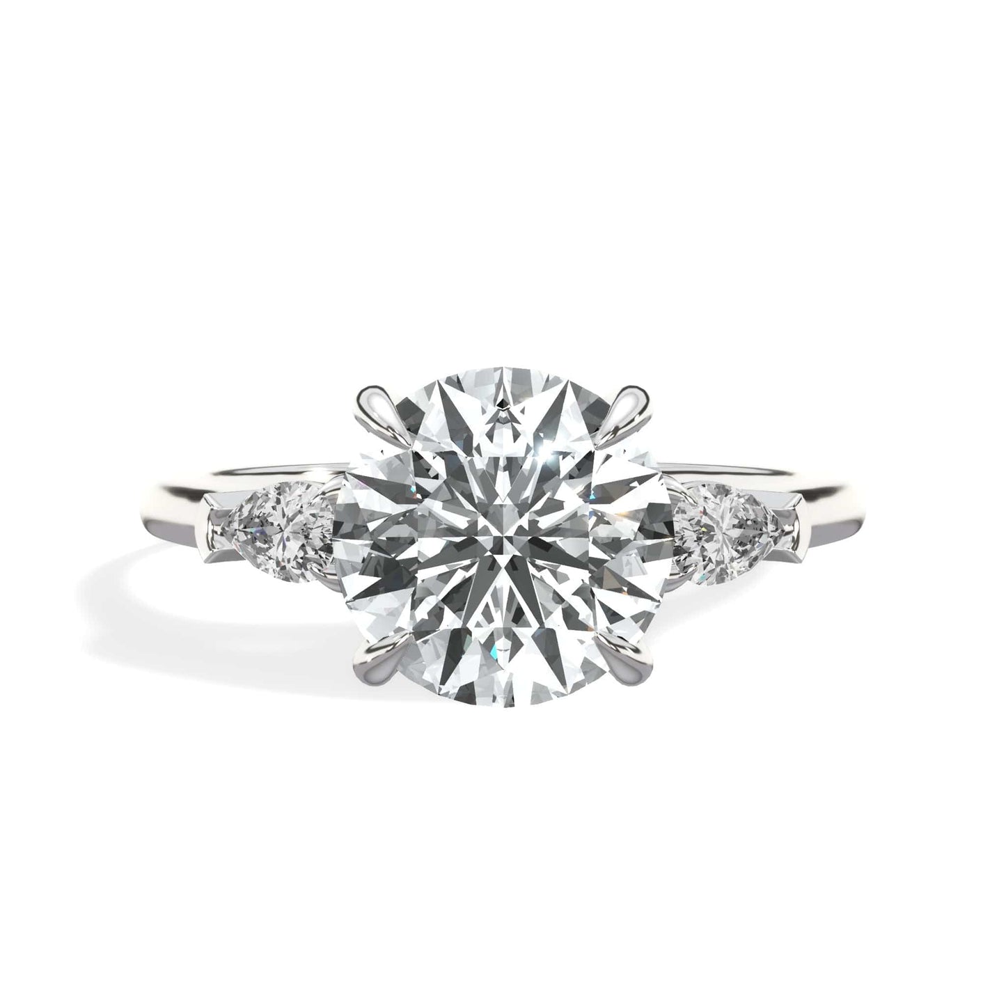 Round diamond engagement ring with pear side stones