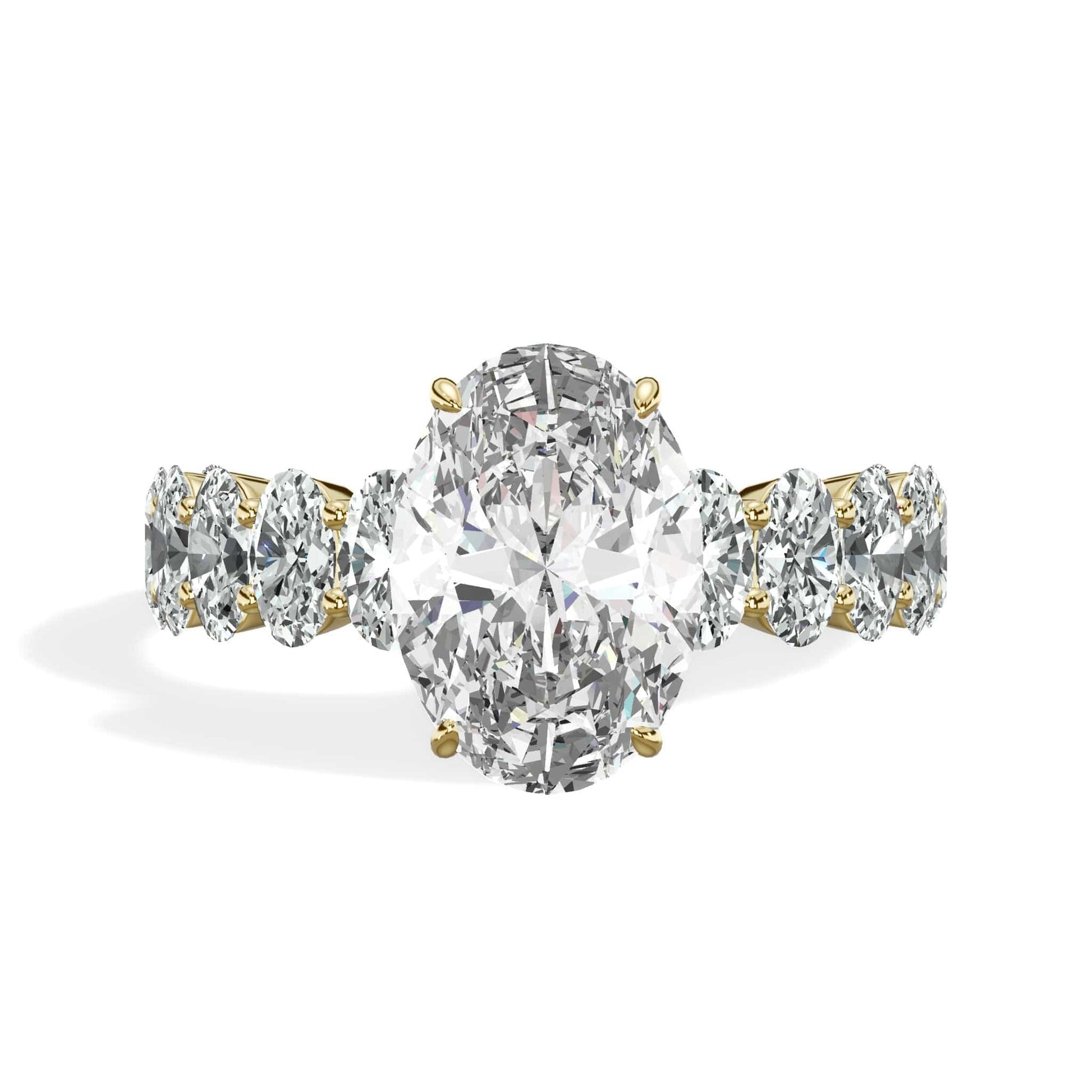 Oval lab grown diamond ring with side stones and yellow gold band