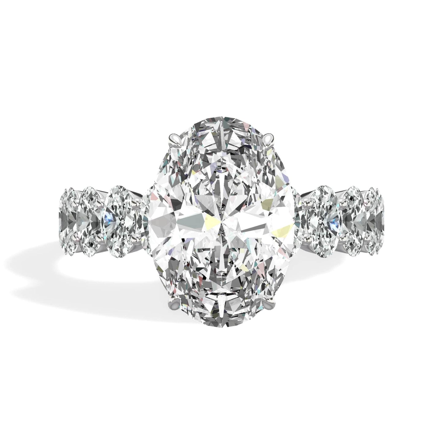 Oval diamond ring with side stones in white gold