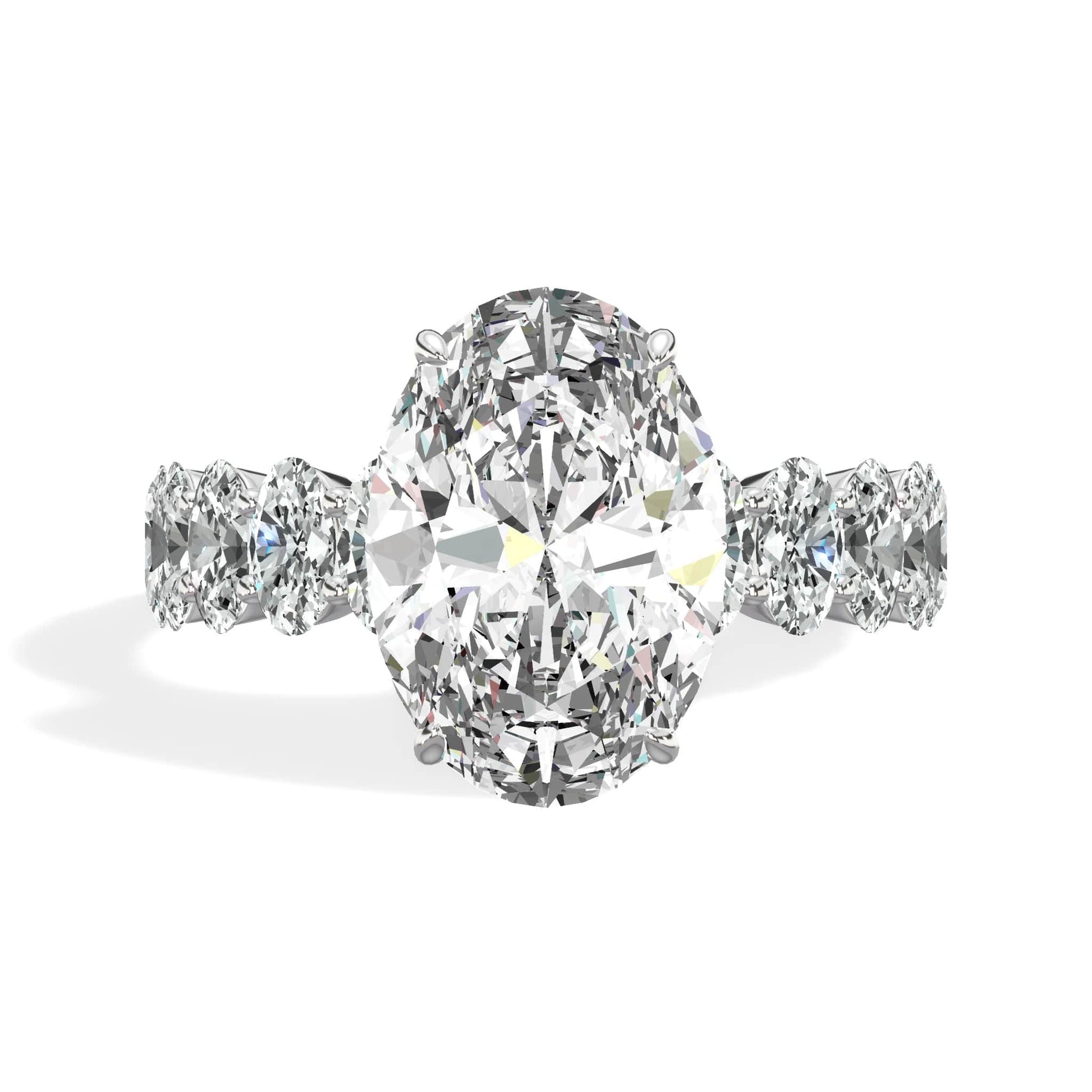 Oval diamond ring with side stones in white gold