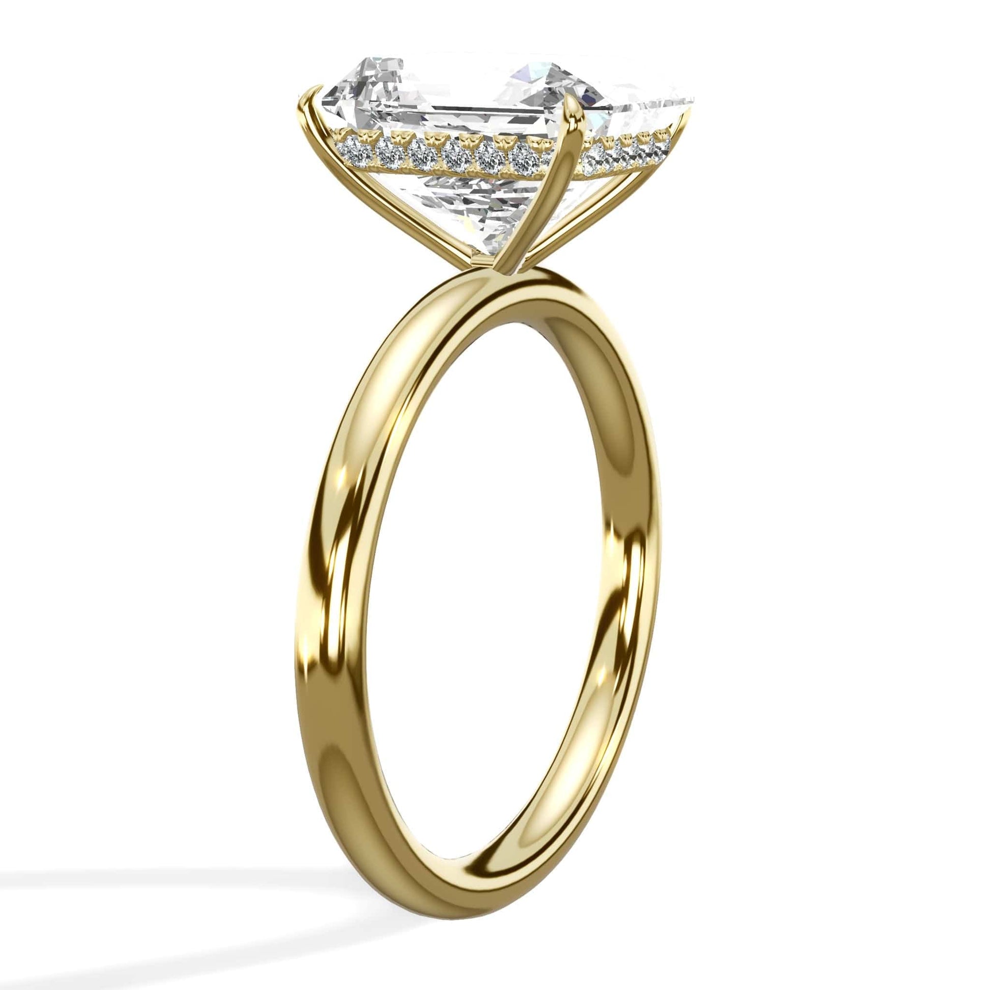 Yellow gold elongated radiant cut diamond ring