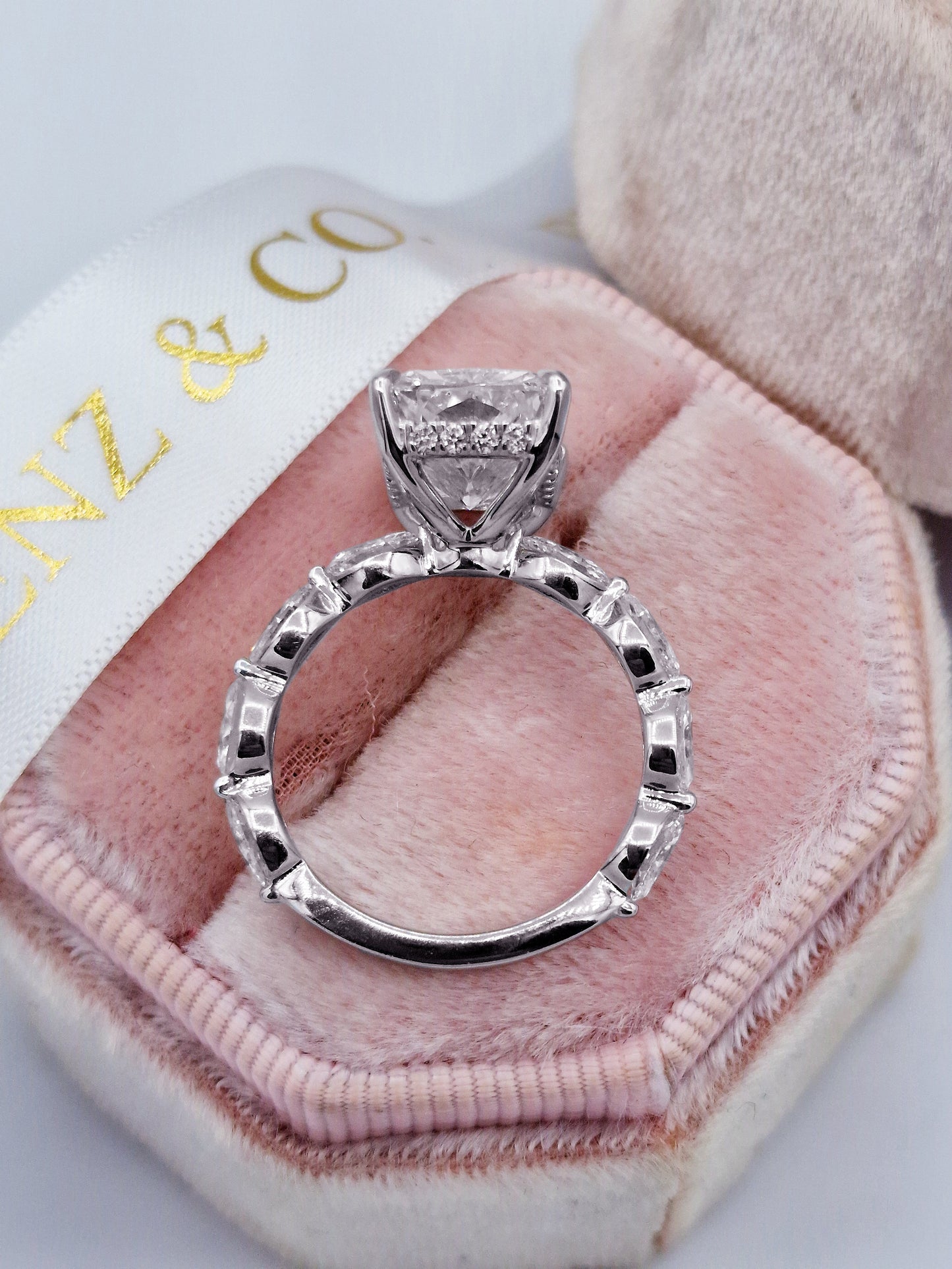 Radiant 5ct diamond engagement ring with marquise side stones, white gold