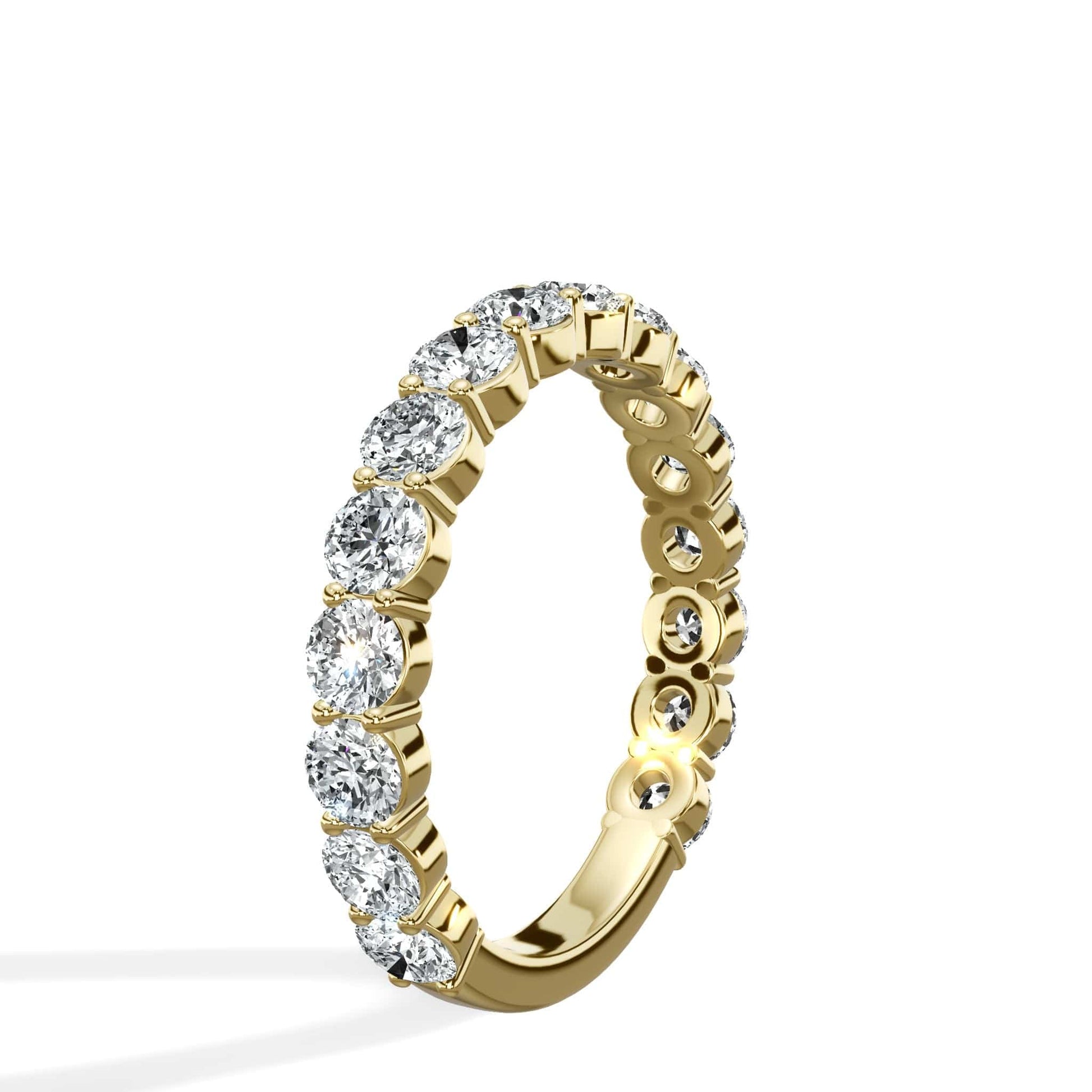 Round cut lab grown diamond eternity band in 14k yellow gold