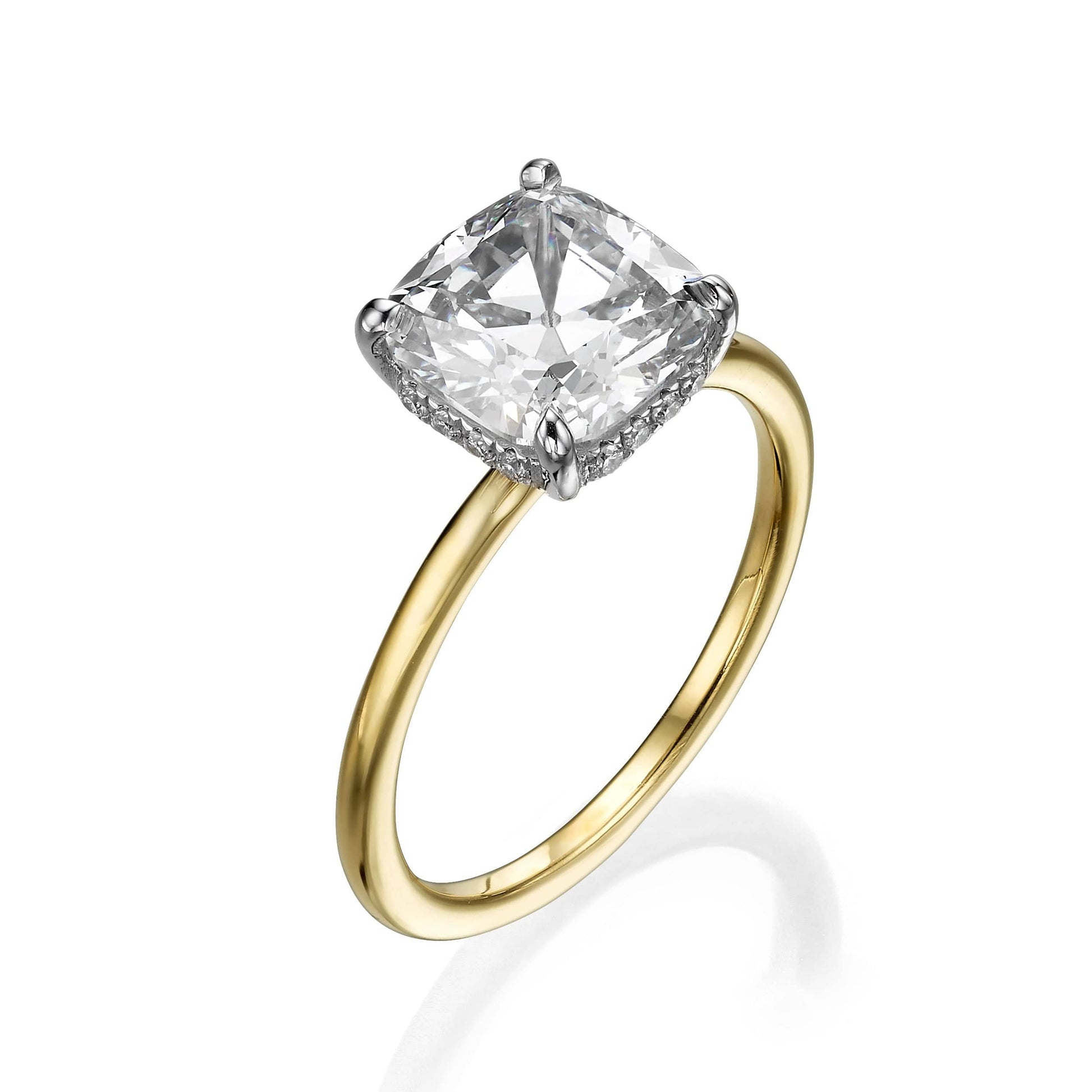 Cushion cut diamond solitaire engagement ring in yellow gold