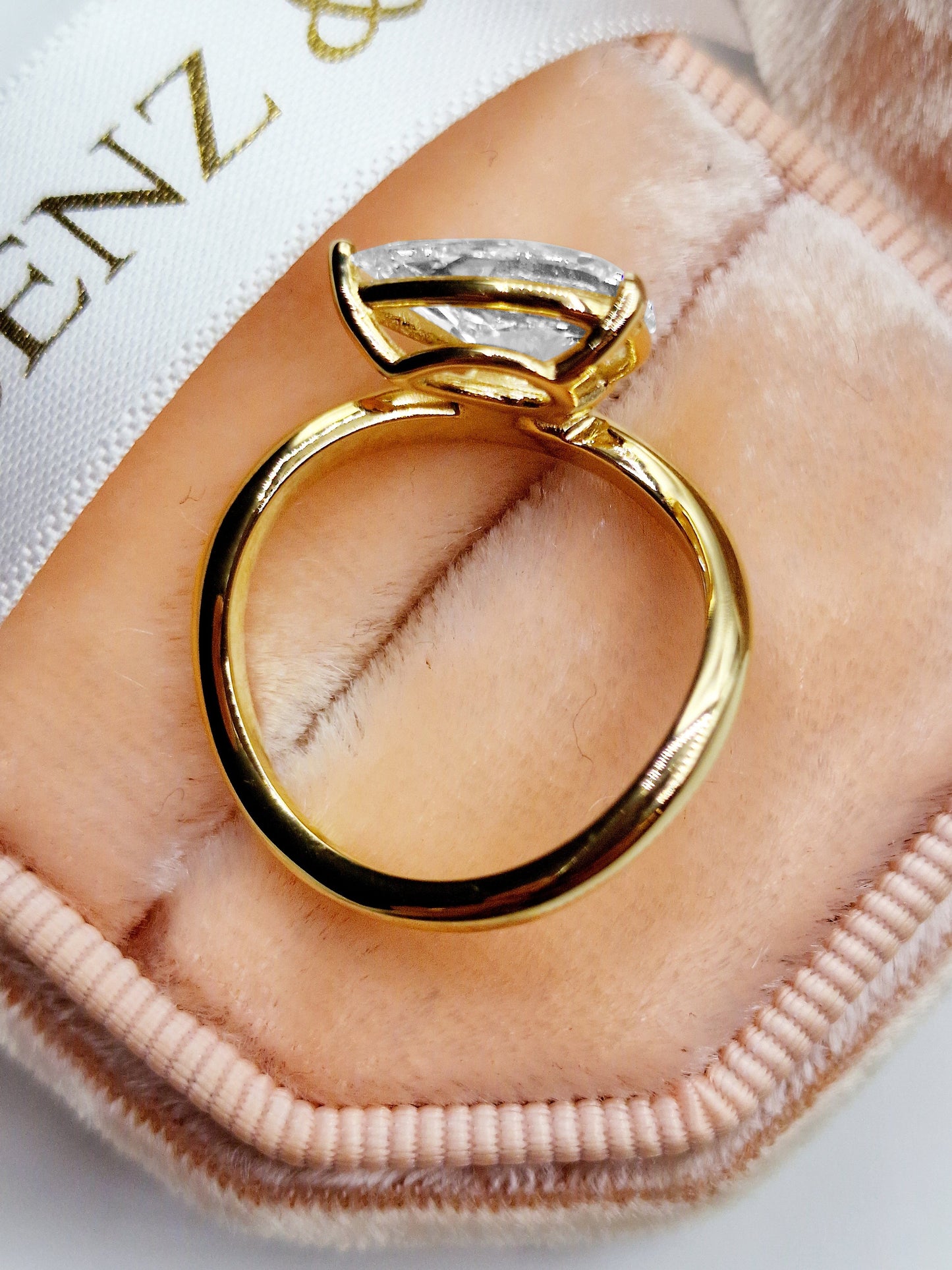 Yellow gold shaped diamond solitaire engagement ring