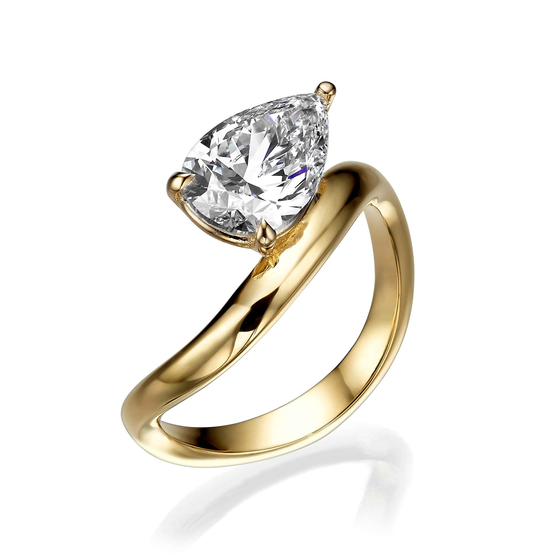Pear-shaped diamond solitaire engagement ring in yellow gold