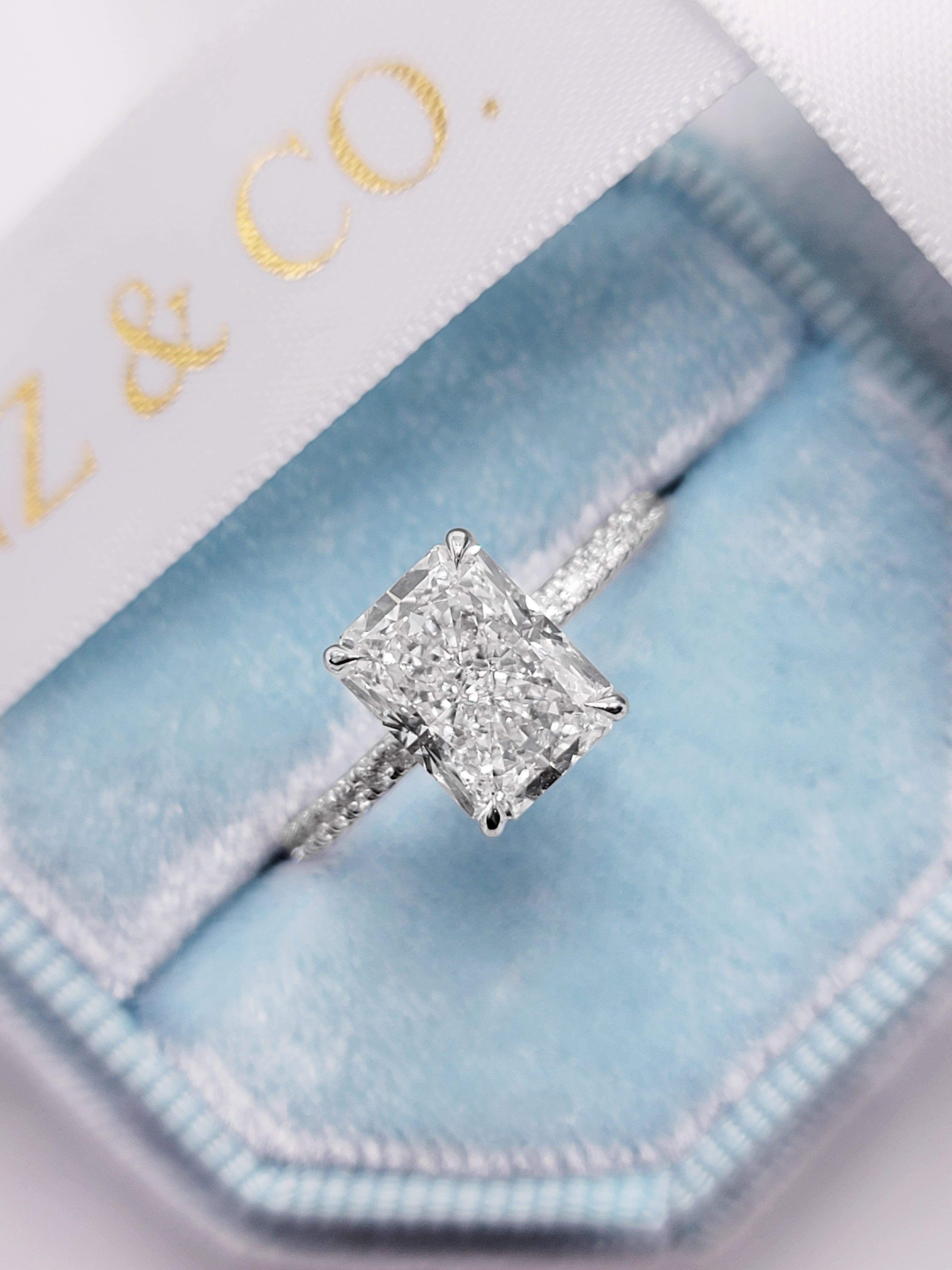 Radiant Cut Diamond Engagement Ring with Hidden Halo