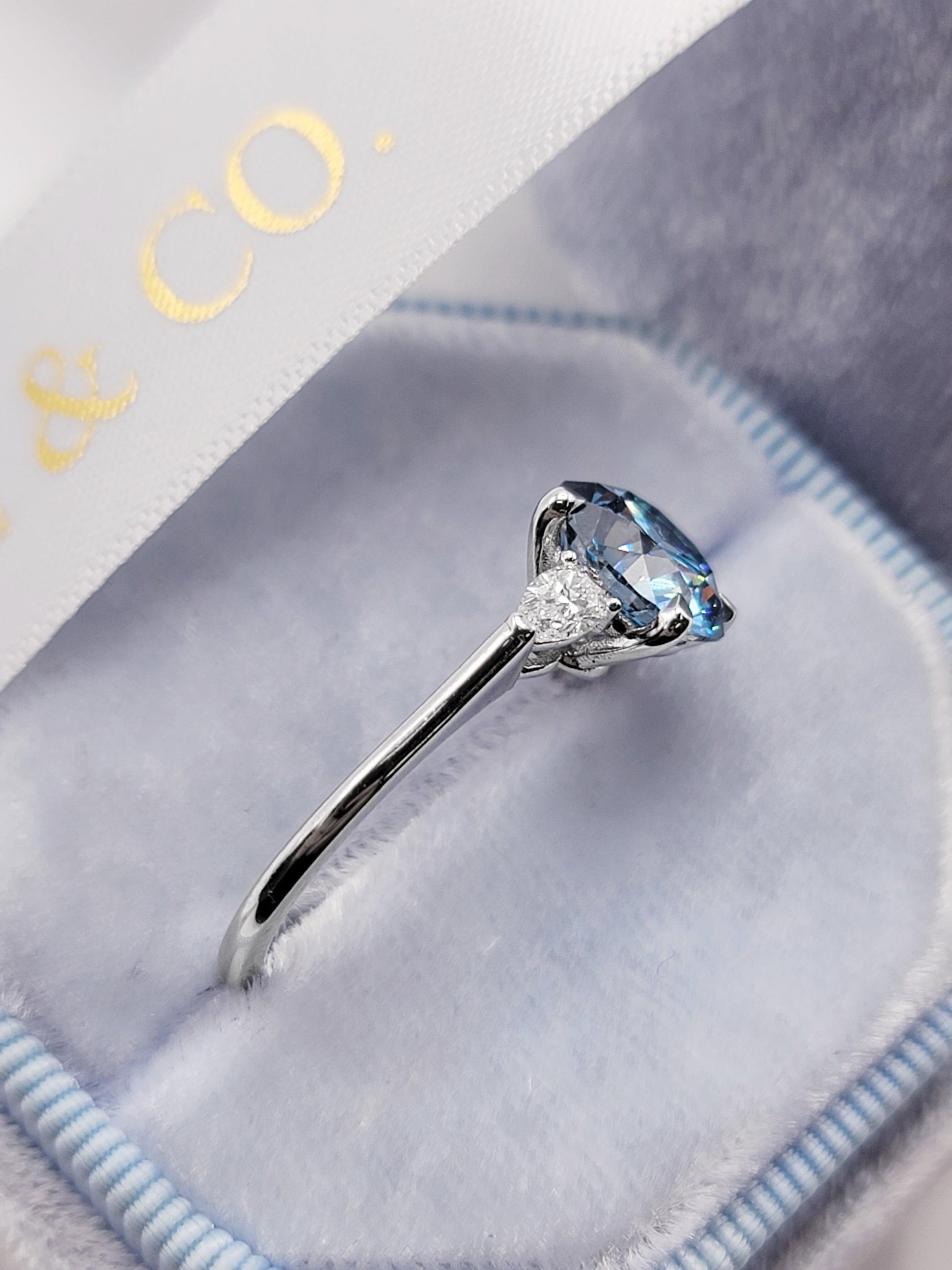 2.35 Carats Lab Grown Fancy Vivid Blue Round Brilliant Cut with Pear Shape Side Stones Diamond Engagement Ring - BenzDiamonds
