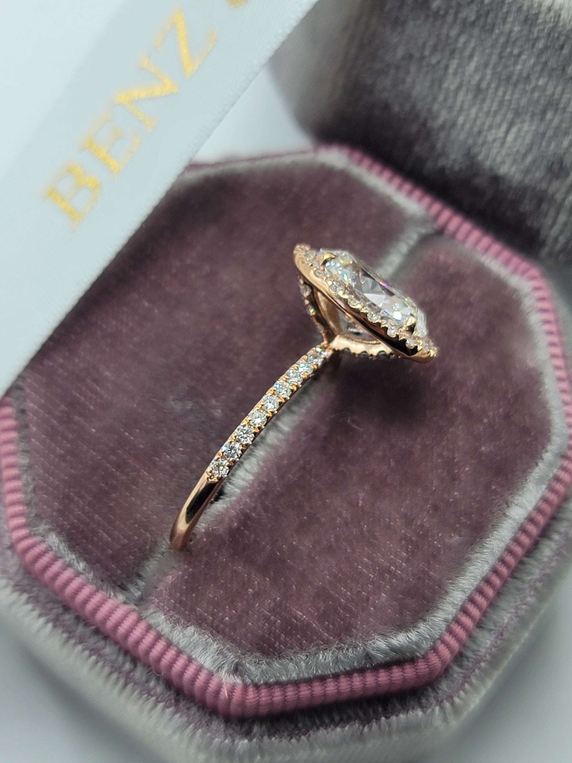 Diamond ring in velvet ring box.