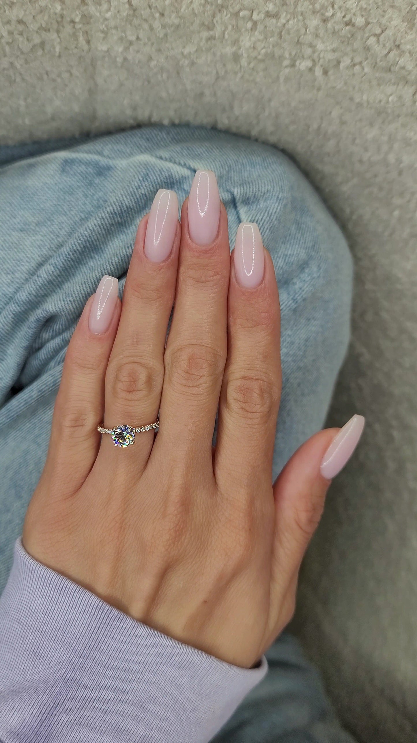 Pale pink manicure with ring, captured Jan 29, 2023