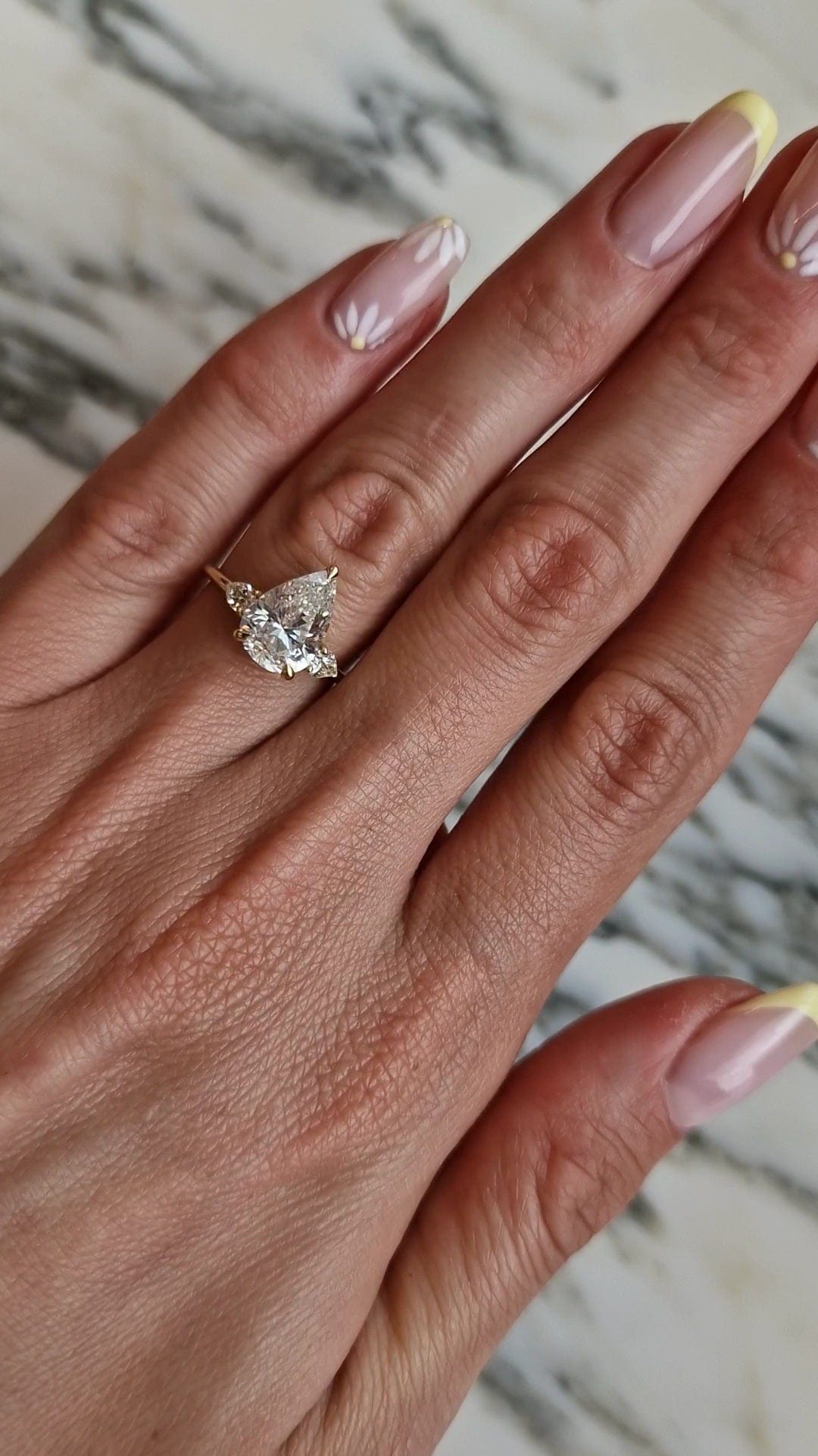 Engagement ring on hand (VideoCapture_20230420-201515)