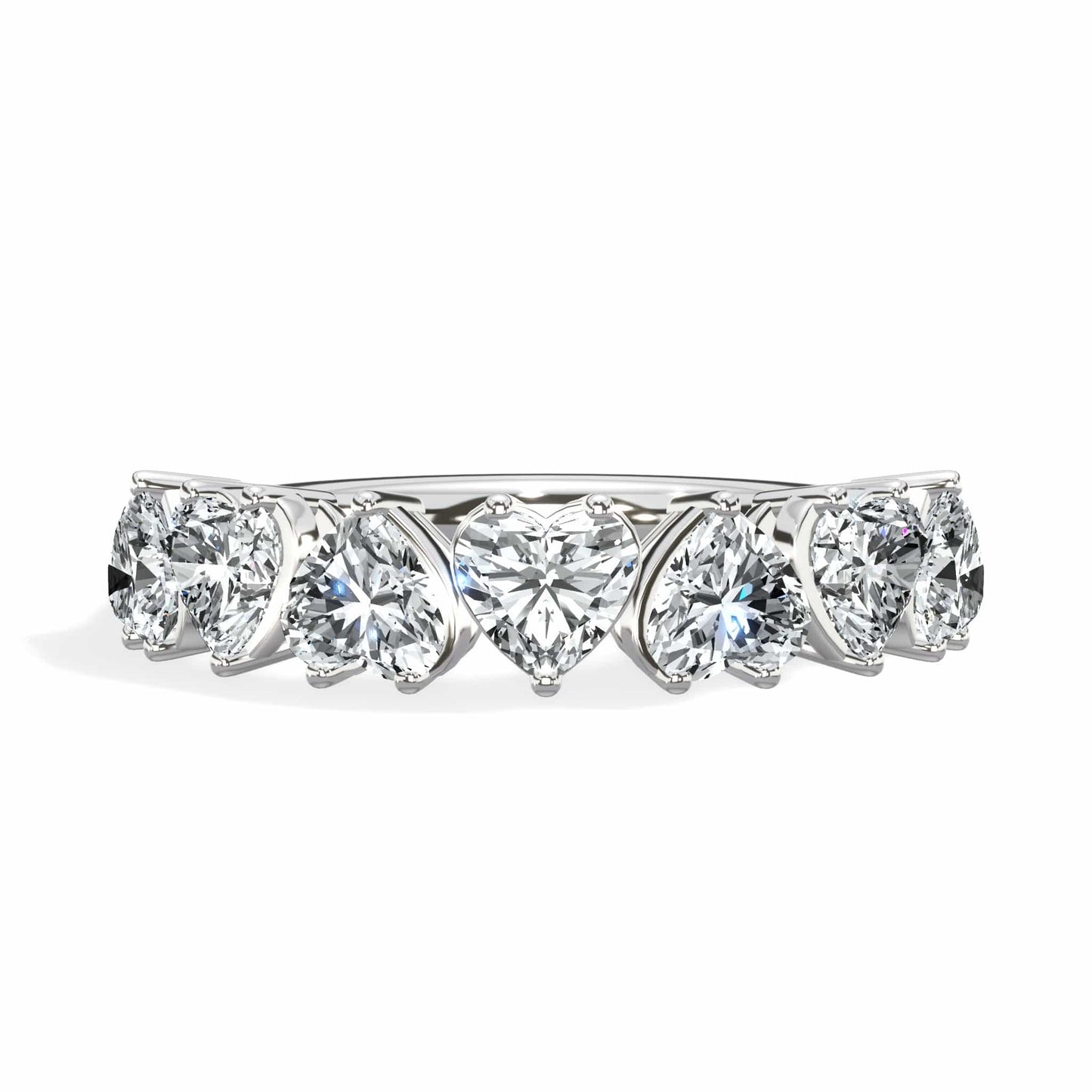 Diamond band ring with heart and round stones.